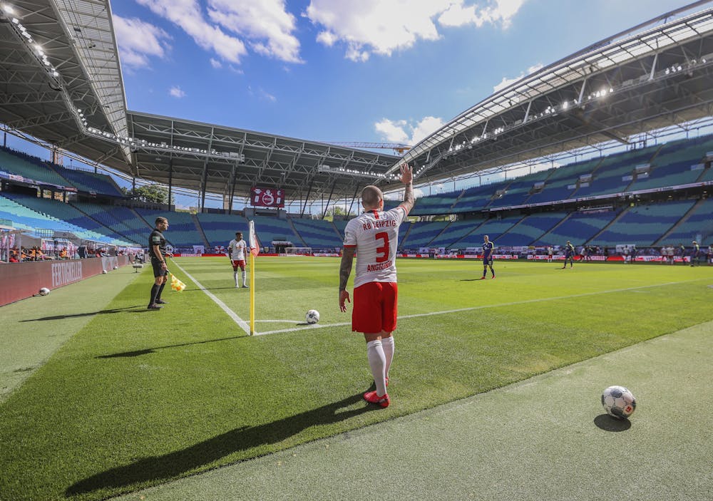 <p>Leipzig's Angelino gestures before taking a corner during the German Bundesliga soccer match between RB Leipzig and SC Freiburg in Leipzig, Germany, Saturday, May 16, 2020. The German Bundesliga becomes the world's first major soccer league to resume after a two-month suspension because of the coronavirus pandemic. (Jan Woitas/dpa via AP)</p>