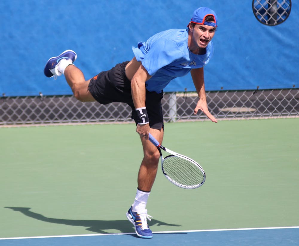 The women's and men's tennis teams defeated Texas A&M Sunday. Photo from UF-Auburn match Feb. 20. 