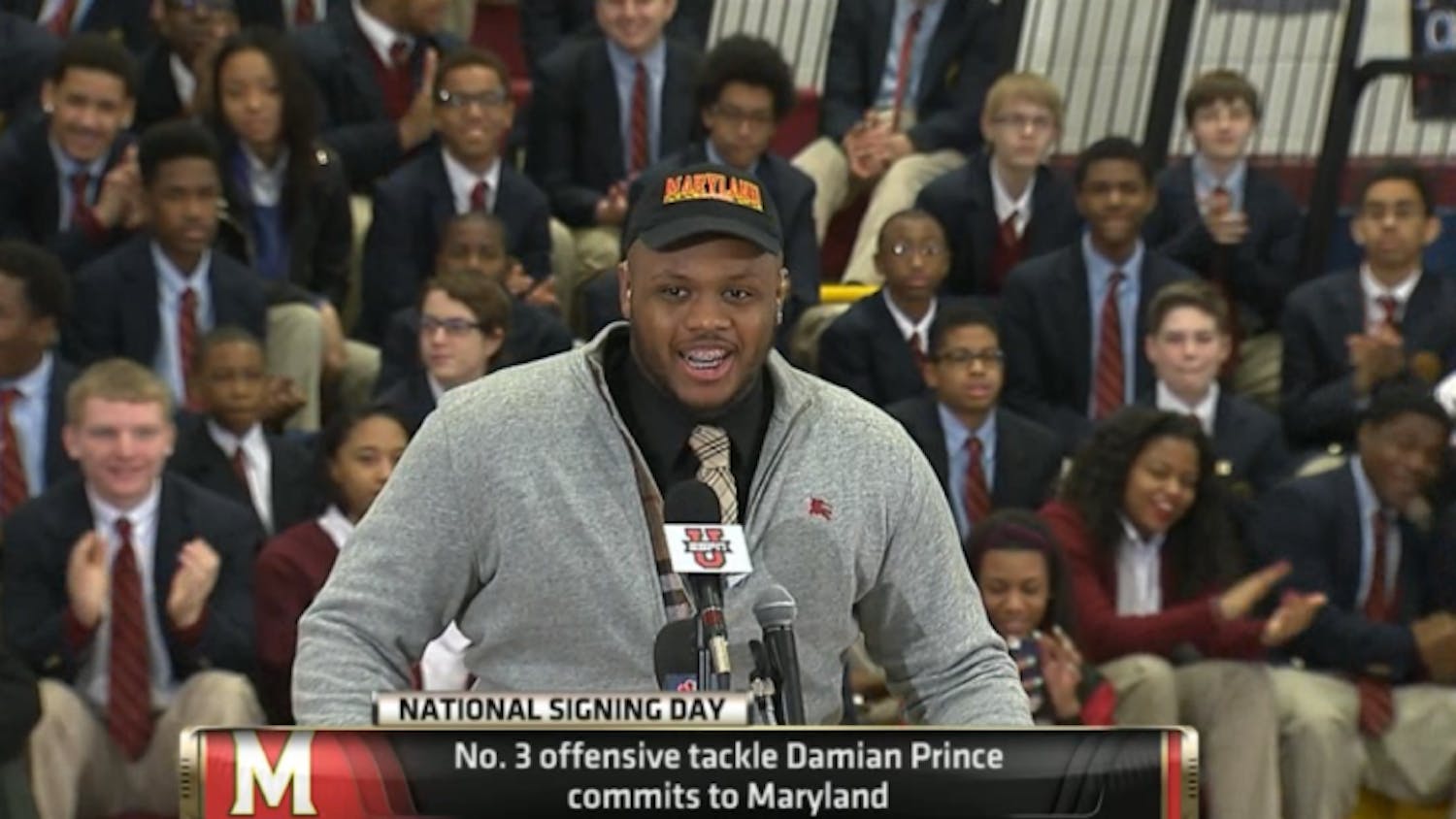 Five-star offensive tackle Damian Prince announces his commitment to Maryland at&nbsp;Bishop McNamara High School on Wednesday morning.