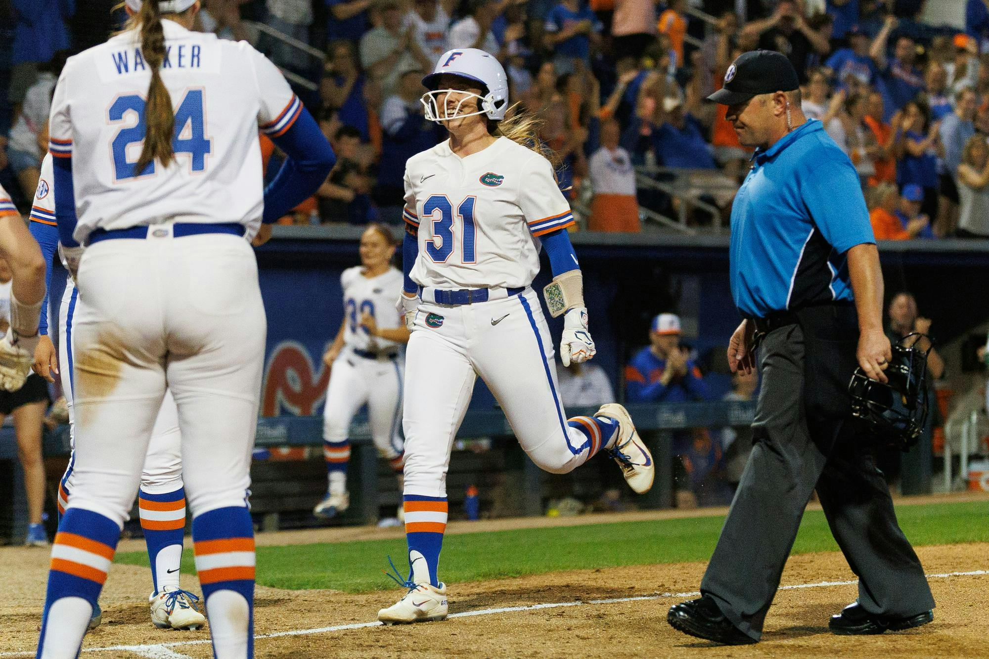 Florida infielder Kenleigh Cahalan (31) celebrates hitting a homerun during an NCAA softball game against Mississippi State, Friday, April 3, 2026, in Gainesville, Fla.