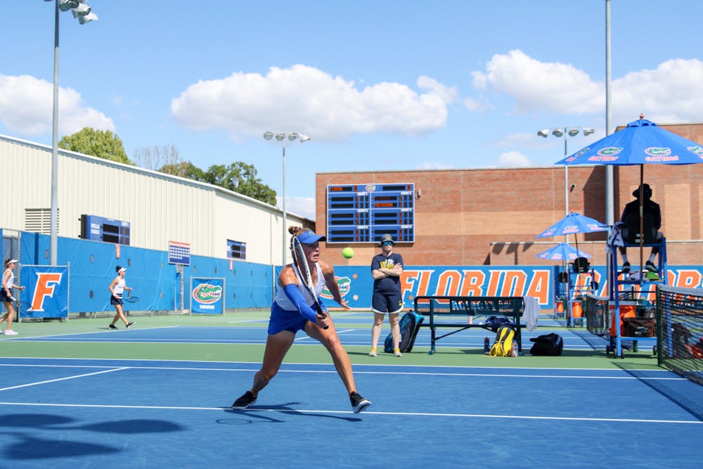 Florida sophomore Bente Spee competes in her doubles match during the Gators' 4-1 win over the Michigan Wolverines Wednesday, March 22, 2023.
