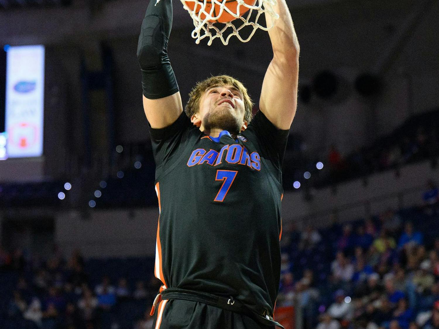 Florida guard Urban Klavzar (7) dunks during the second half of an NCAA college basketball game against Saint Francis, Wednesday, Dec. 17, 2025, in Gainesville, Fla.
