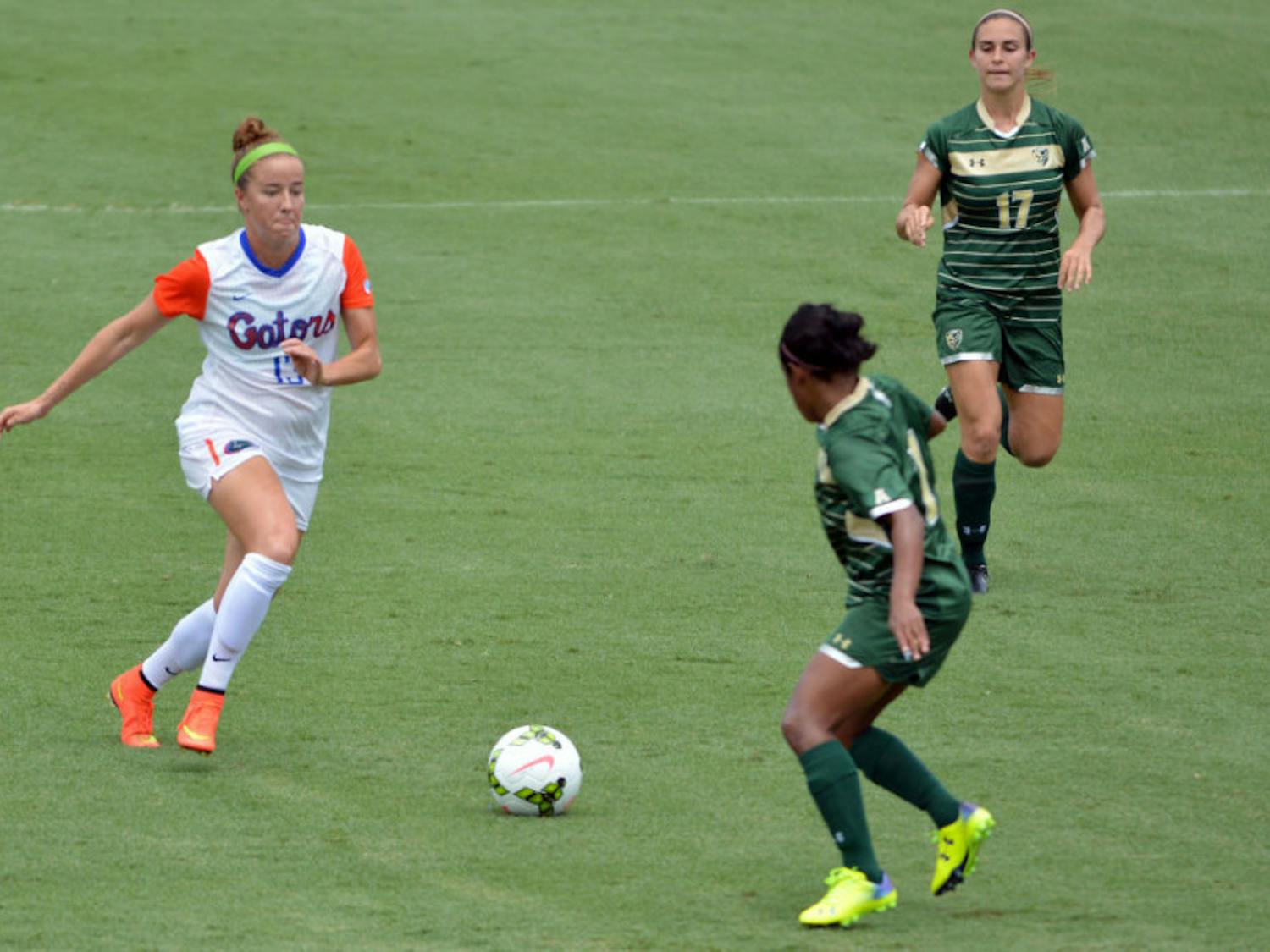 Annie Speese (13) dribbles the ball down the field during Florida's 2-0 win against South Florida on Sunday at Donald R. Dizney Stadium. Speese scored both of UF's goals.
