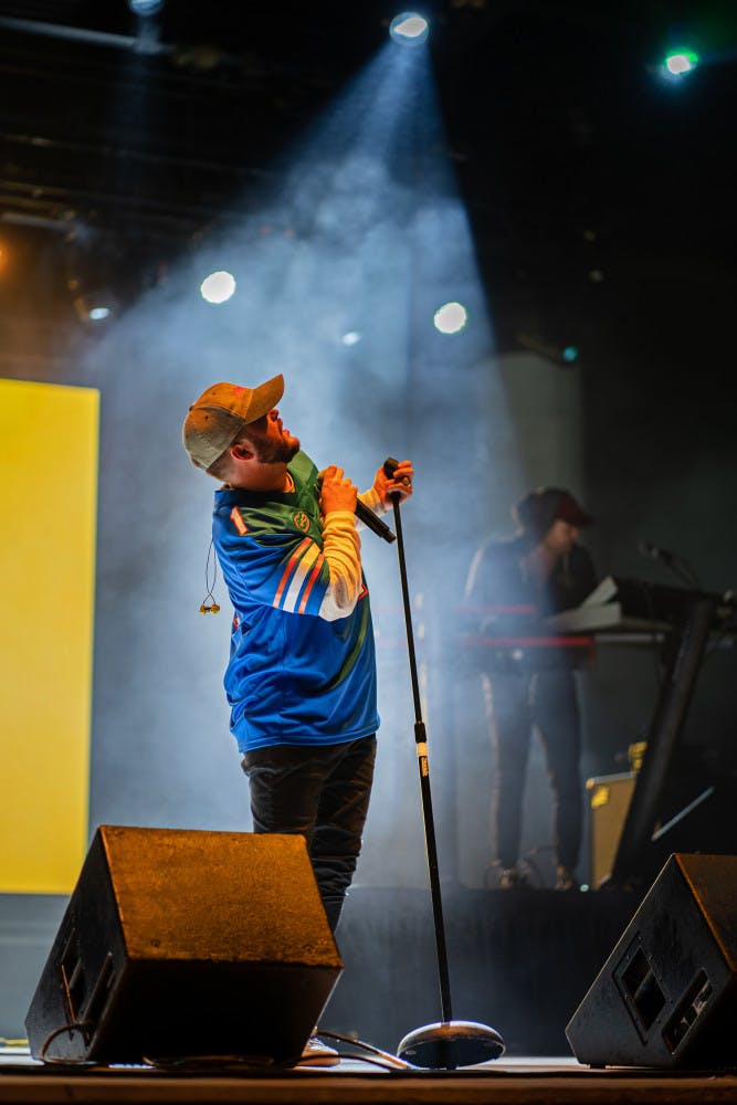 Quinn XCII shows off his UF jersey Friday night during the Fall concert at Flavet Field.