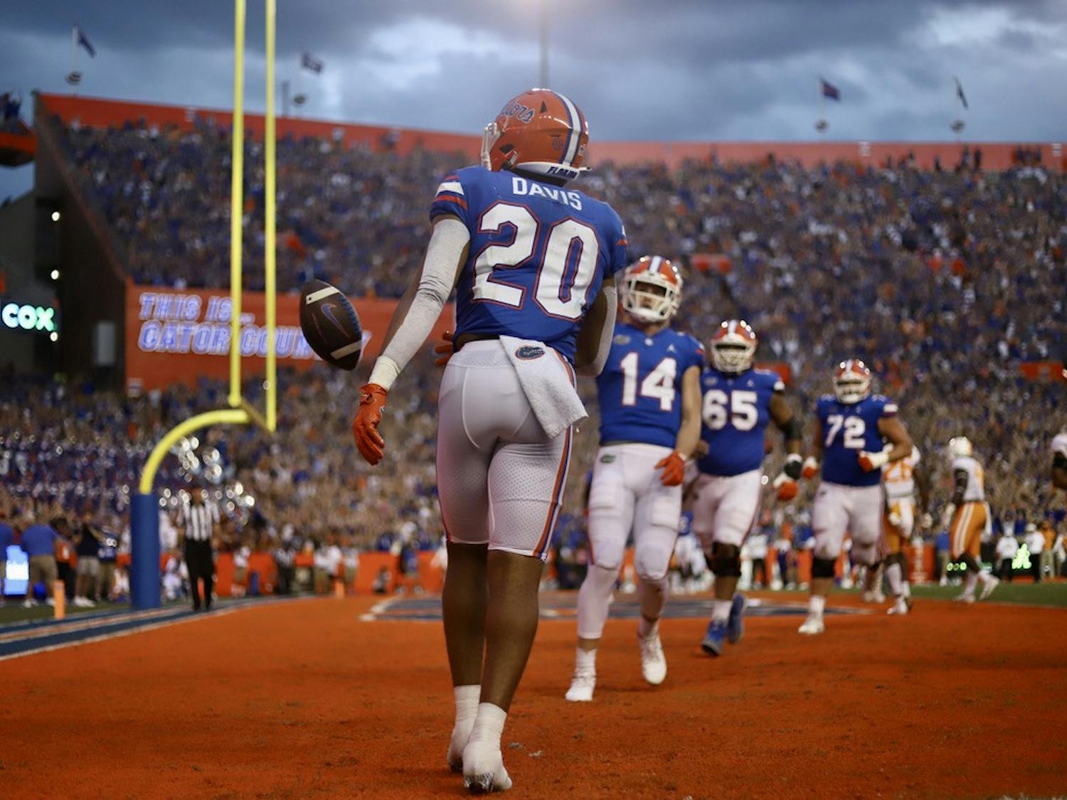 Florida's Malik Davis (20) celebrates an early touchdown against Tennessee on Sept. 25.