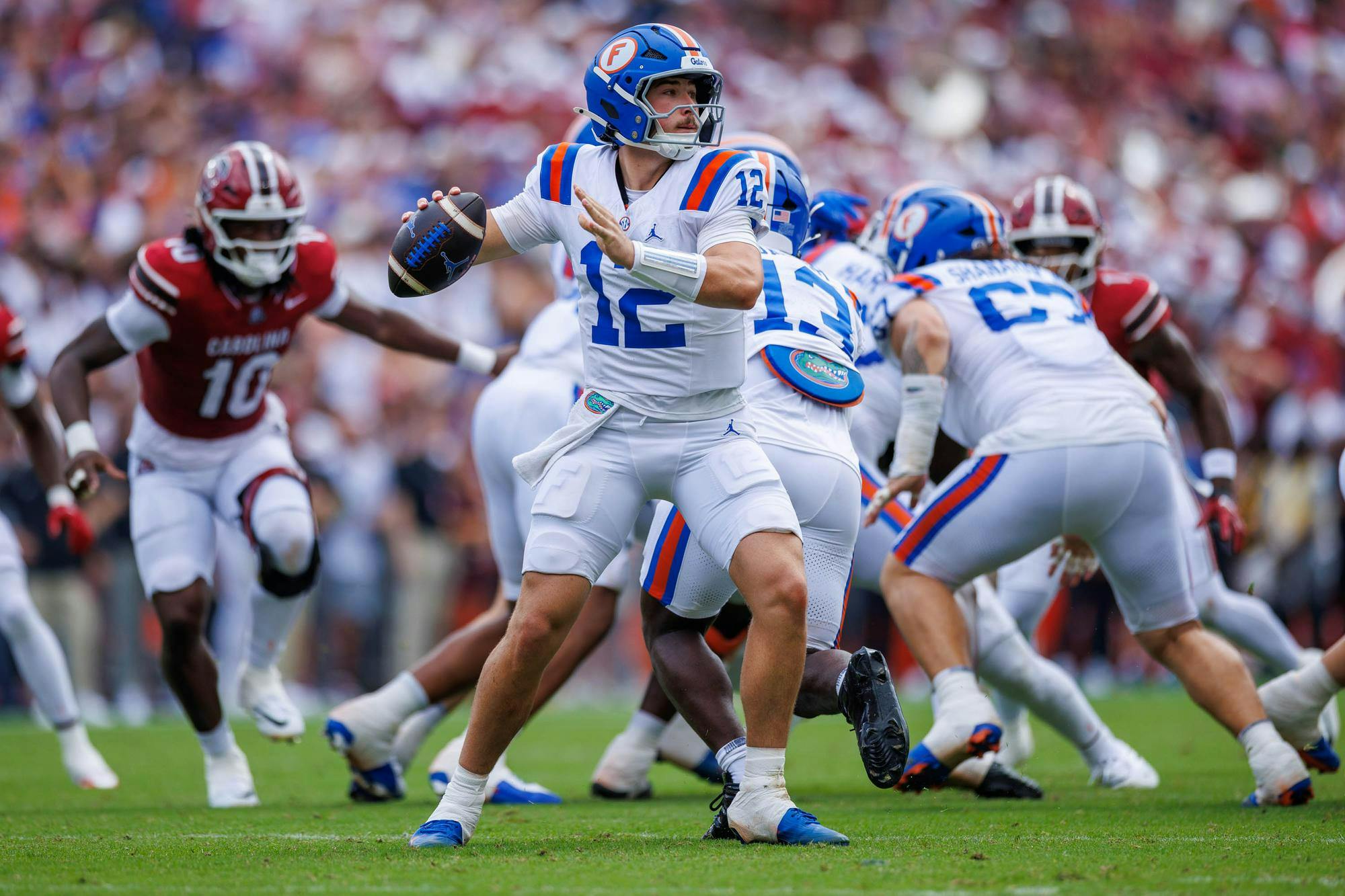 Florida quarterback Aaron Philo (12) looks to pass during the first half of an NCAA college football game against South Carolina, Saturday, Oct. 10, 2026, in Gainesville, Fla.