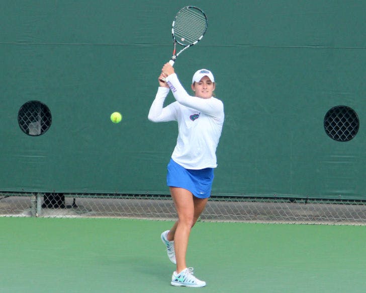 Kourtney Keegan returns a ball during Florida’s 4-0 win against Harvard on Jan. 26 at the Ring Tennis Complex.