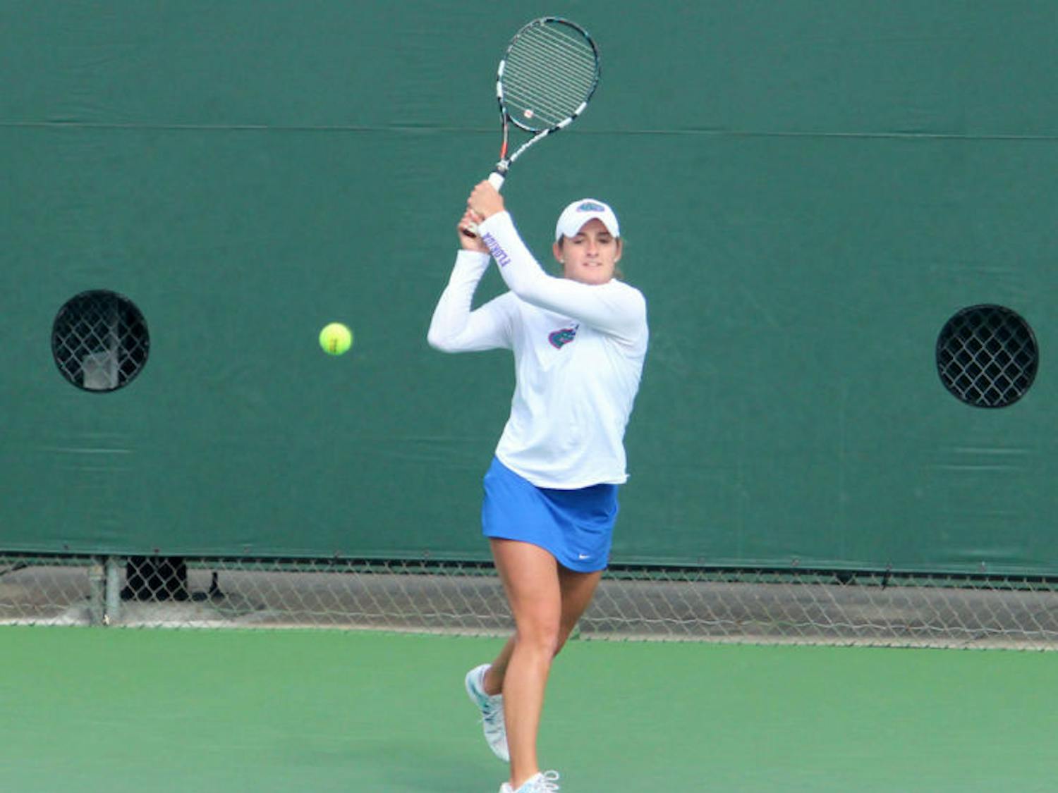 Kourtney Keegan returns a ball during Florida’s 4-0 win against Harvard on Jan. 26 at the Ring Tennis Complex.