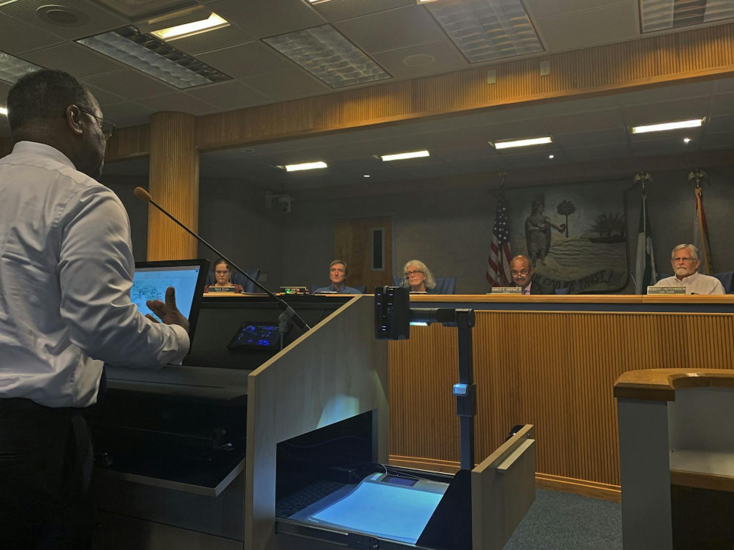 James McKnight, a 62-year-old Gainesville resident, speaks to county commissioners during public comment at a meeting on Tuesday evening. McKnight and his neighbors spoke about the lack of road maintenance at NE 27th Avenue in Northeast Gainesville. 
