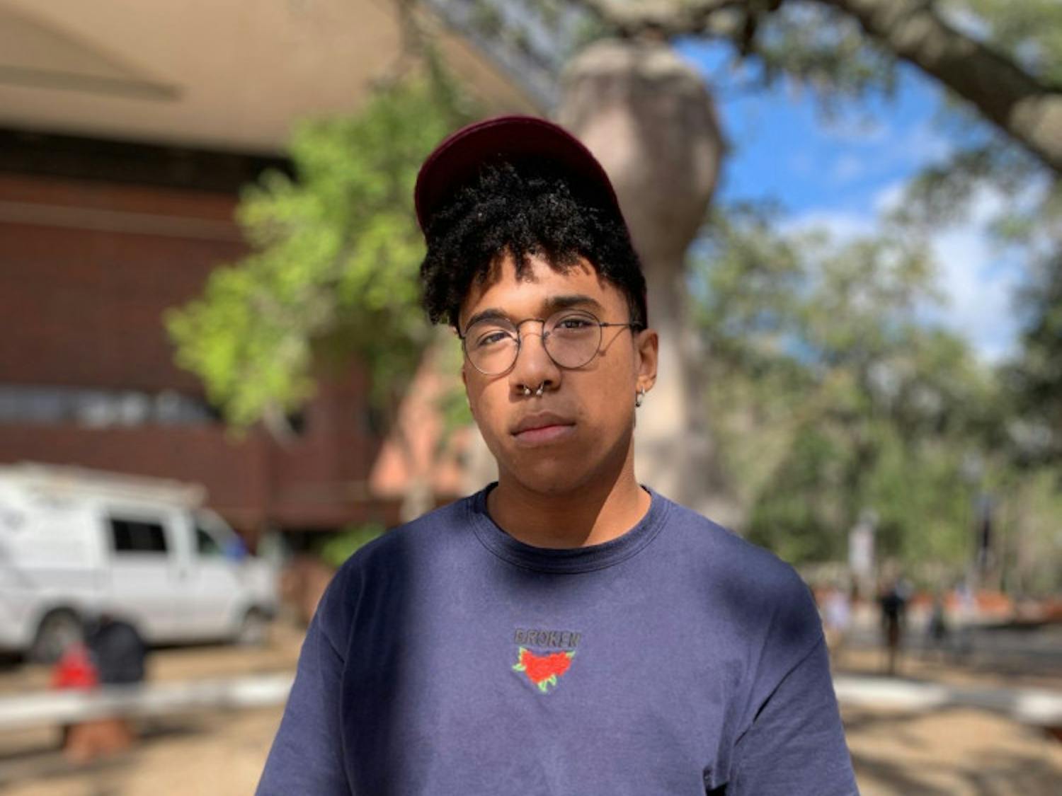 Chad Clarke, Senior, Economics, 21
Style: Avante Garde
Fashion Icon(s): Frank Ocean, Jaden Smith (Twitter: @officialjaden), Tyler The Creator (Twitter: @tylerthecreator)
Biggest Fashion Tip: Don’t just buy expensive things to keep up with fashion trends, create your own style.
“If it’s your style, own it,” he said.
Where His Style Came From: Having a close relationship with his brother, who taught him fashion sense, is where his roots in fashion came from. When his brother started dating a renowned fashion designer, who happened to be behind the looks in Ariana Grande’s “thank u, next” video, he began branching out with his looks. He idolizes his brother's girlfriend for her ability to look past the gender on the label of clothes.
Go-to Winter Outfit: Turtleneck sweater with a marble knit scarf turned circle scarf, loafers and navy blue, tapered pants.