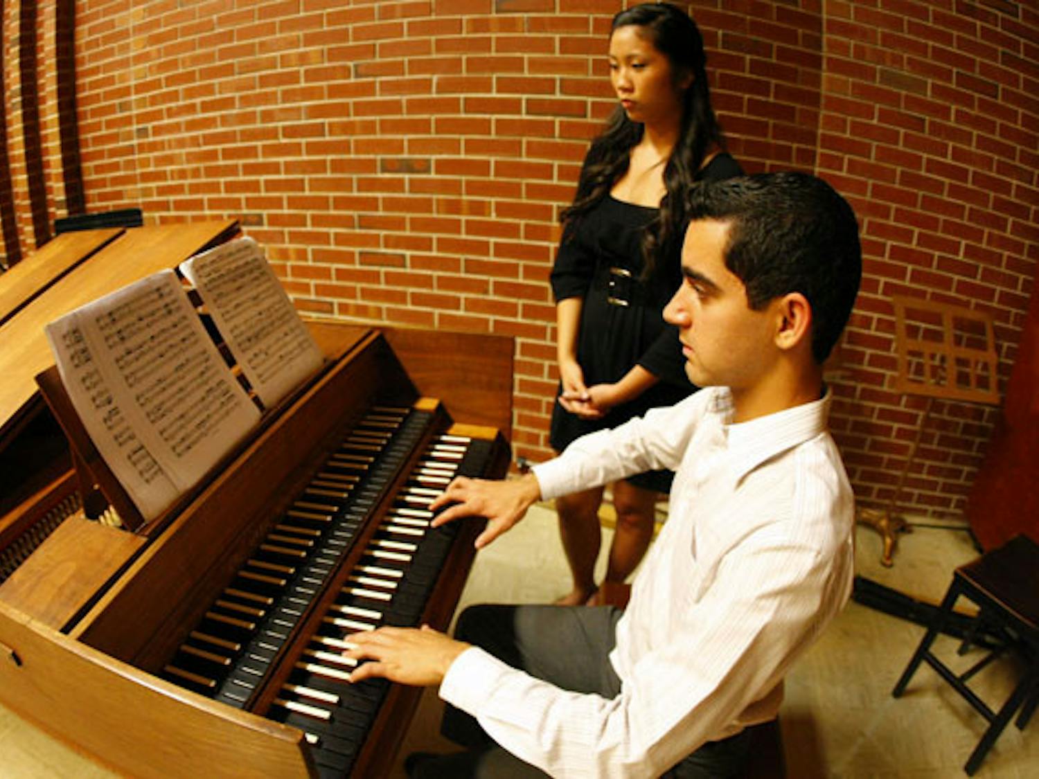 Peter Orta plays "Sonata for Two Harpsichords in F Major" by Bach at the Harpsichord Ensemble studio recital Monday afternoon. Students demonstrated skills they learned during the first semester the harpsichord was taught at UF.