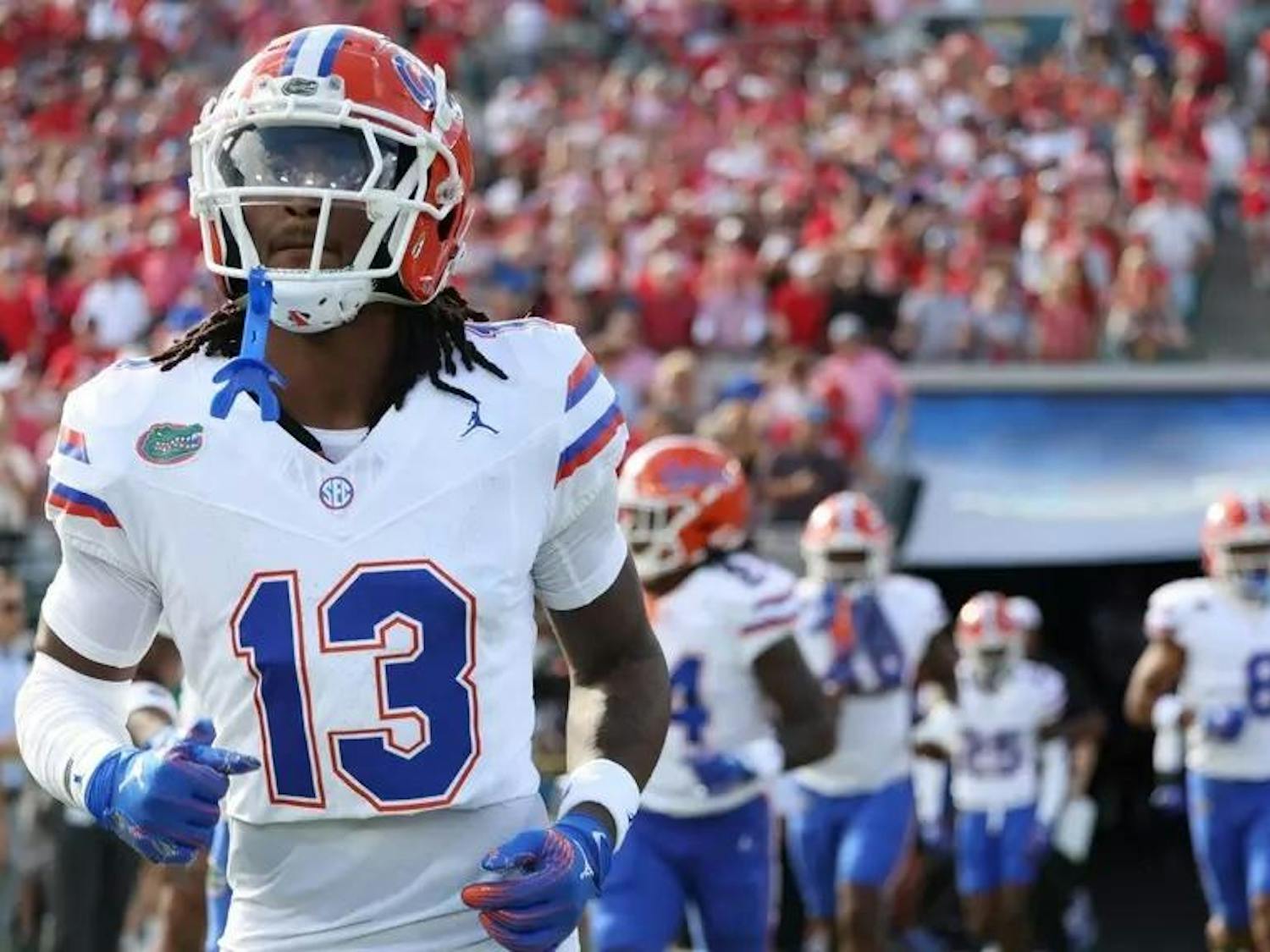 Aaron Gates jogs onto the field at EverBank stadium in Jacksonville, Florida, to face the Georgia Bulldogs on Nov. 2, 2024. Courtesy of UAA Communications / Catherine McCarthy
