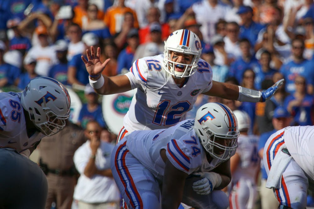 Austin Appleby (12) directs the offense during Florida's 38-28 loss to Tennessee on Sept. 25, 2016, at Neyland Stadium. Appleby passed for 296 yards, three touchdowns and one interception.