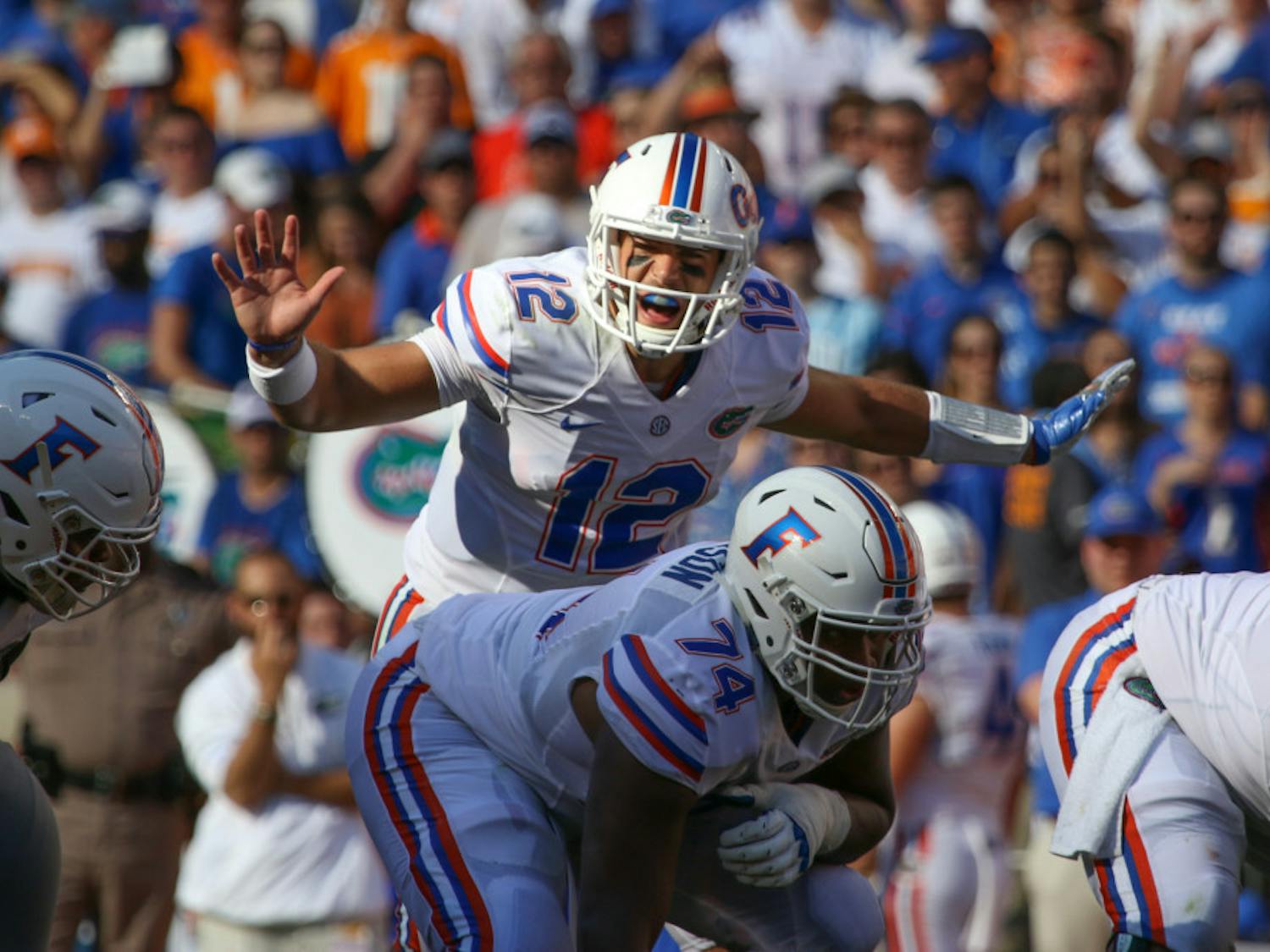 Austin Appleby (12) directs the offense during Florida's 38-28 loss to Tennessee on Sept. 25, 2016, at Neyland Stadium. Appleby passed for 296 yards, three touchdowns and one interception.