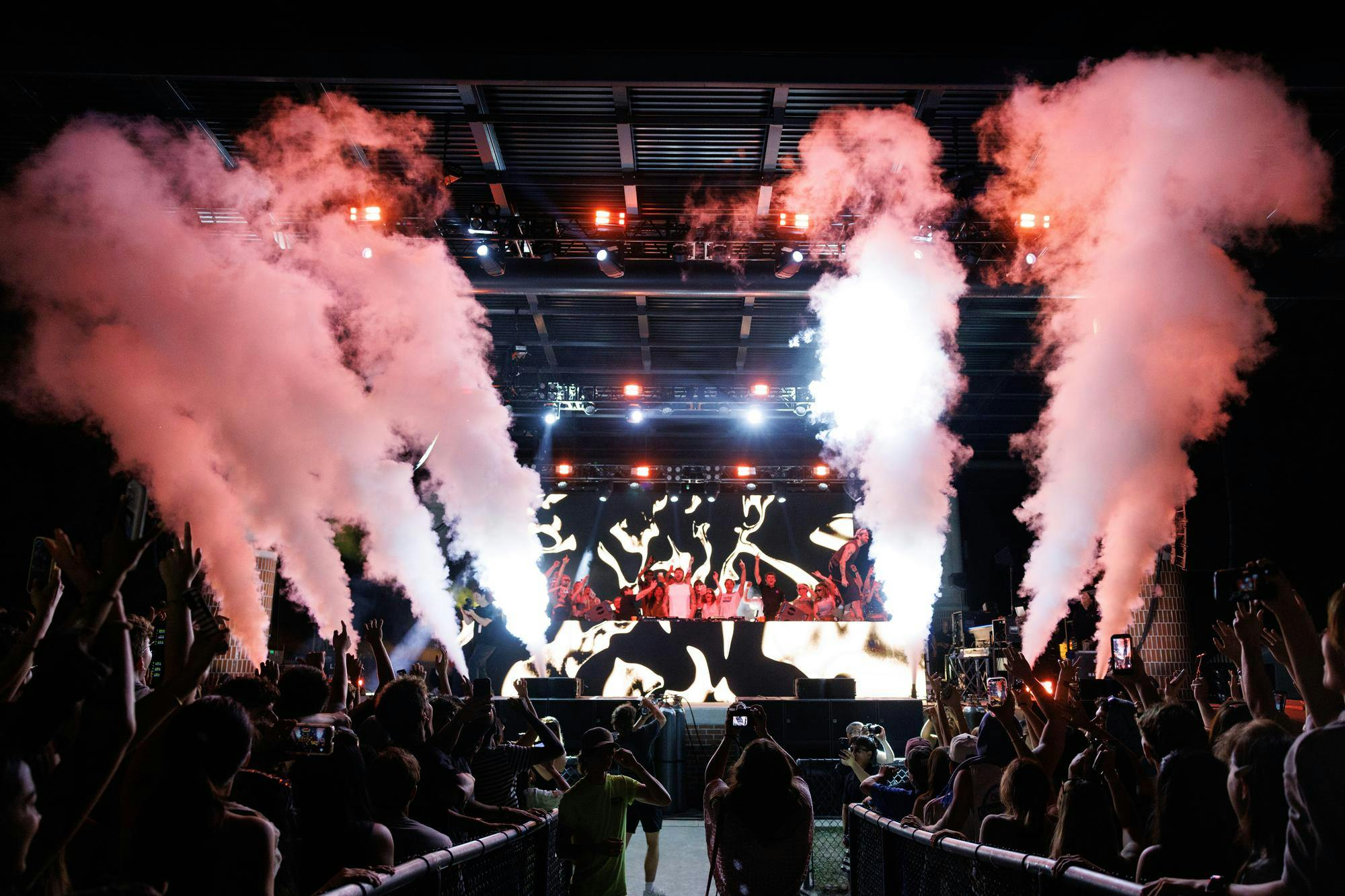 Smoke is shot into the air as The Chainsmokers perform “Something Just Like This” during SwampFest, Tuesday, April 14, 2026, in Gainesville, Fla.