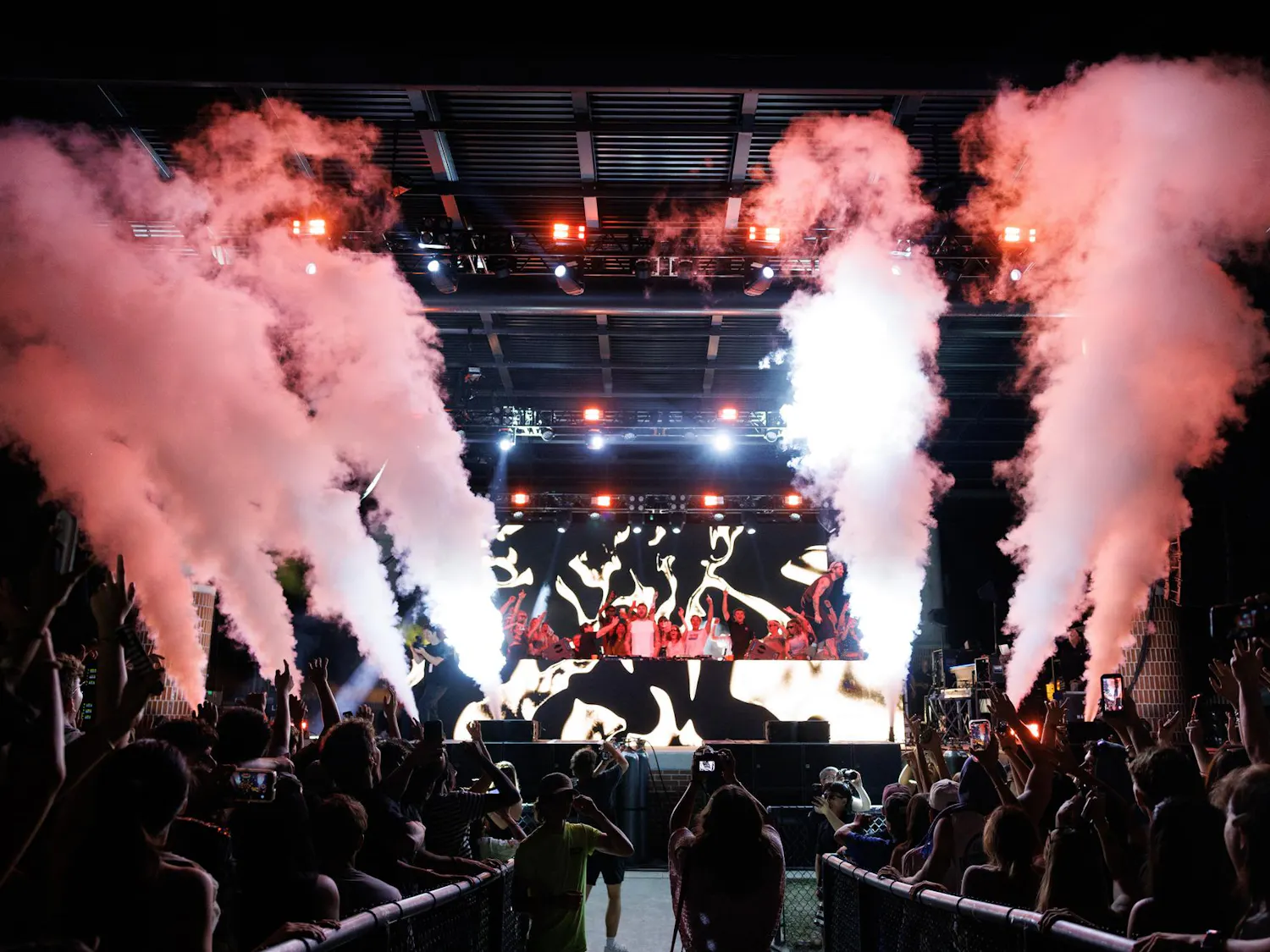 Smoke is shot into the air as The Chainsmokers perform “Something Just Like This” during SwampFest, Tuesday, April 14, 2026, in Gainesville, Fla.