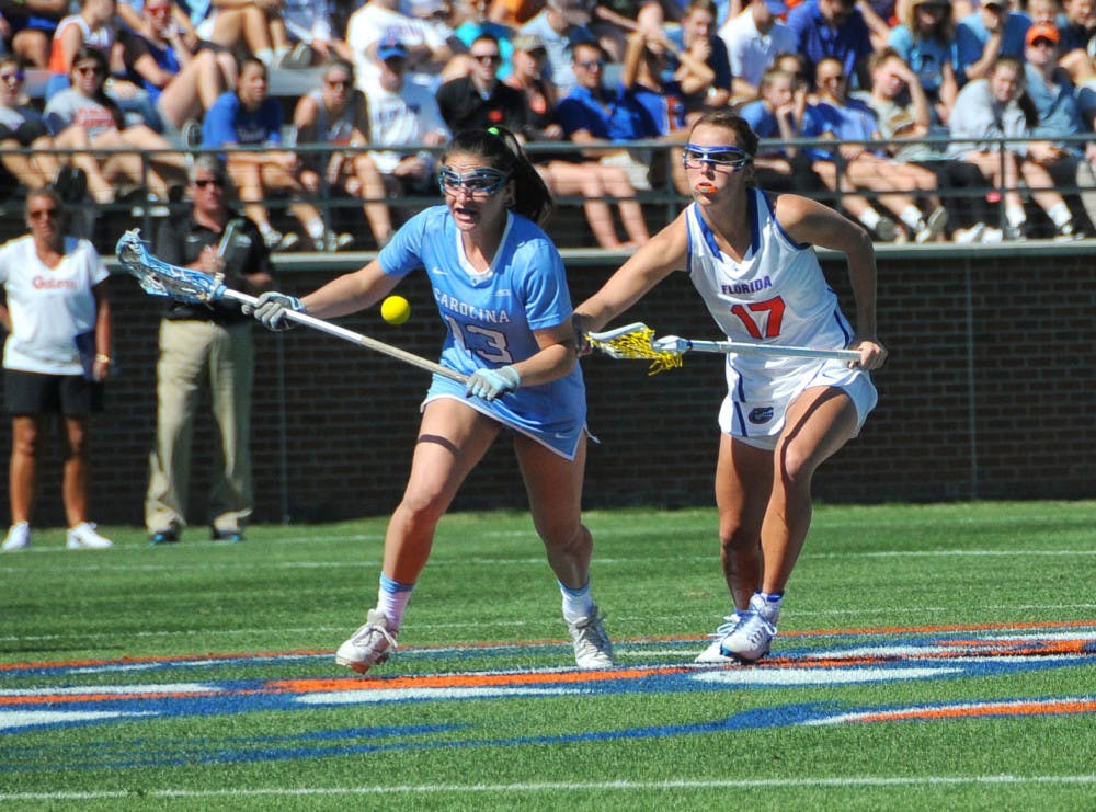 Florida attacker Mollie Stevens (right) chases the ball in UF's loss to North Carolina on Feb. 11.&nbsp;