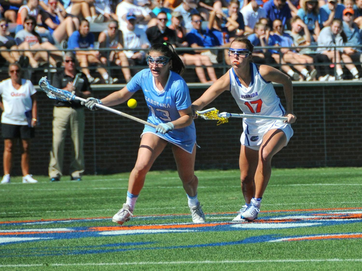 Florida attacker Mollie Stevens (right) chases the ball in UF's loss to North Carolina on Feb. 11.&nbsp;