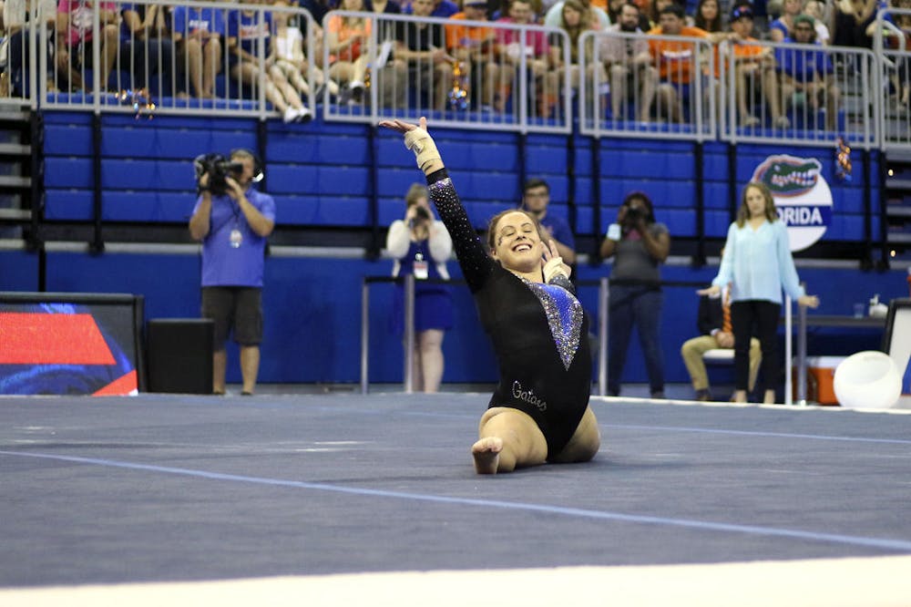 <p>Grace McLaughlin performs her floor routine during Florida's win over North Carolina on March 11, 2016, in the O'Connell Center.</p>