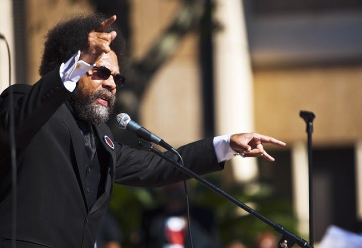 Best-selling author and activist Cornel West speaks Friday at Bo Diddley Community Plaza, the home base of the Occupy Gainesville movement.