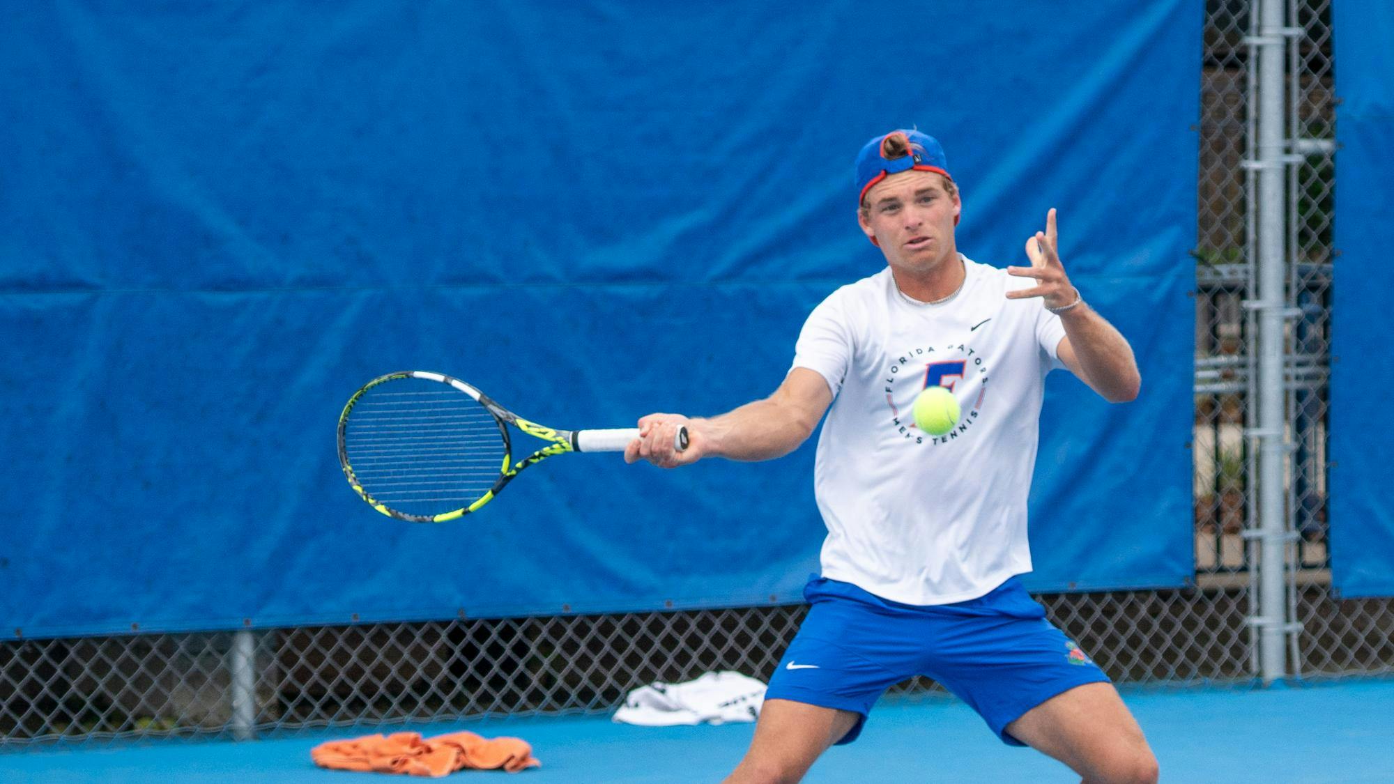 Florida’s Kevin Edengren returns the ball in a NCAA men's doubles tennis match against Oklahoma, Sunday, March 29, 2026, in Gainesville, Fla.