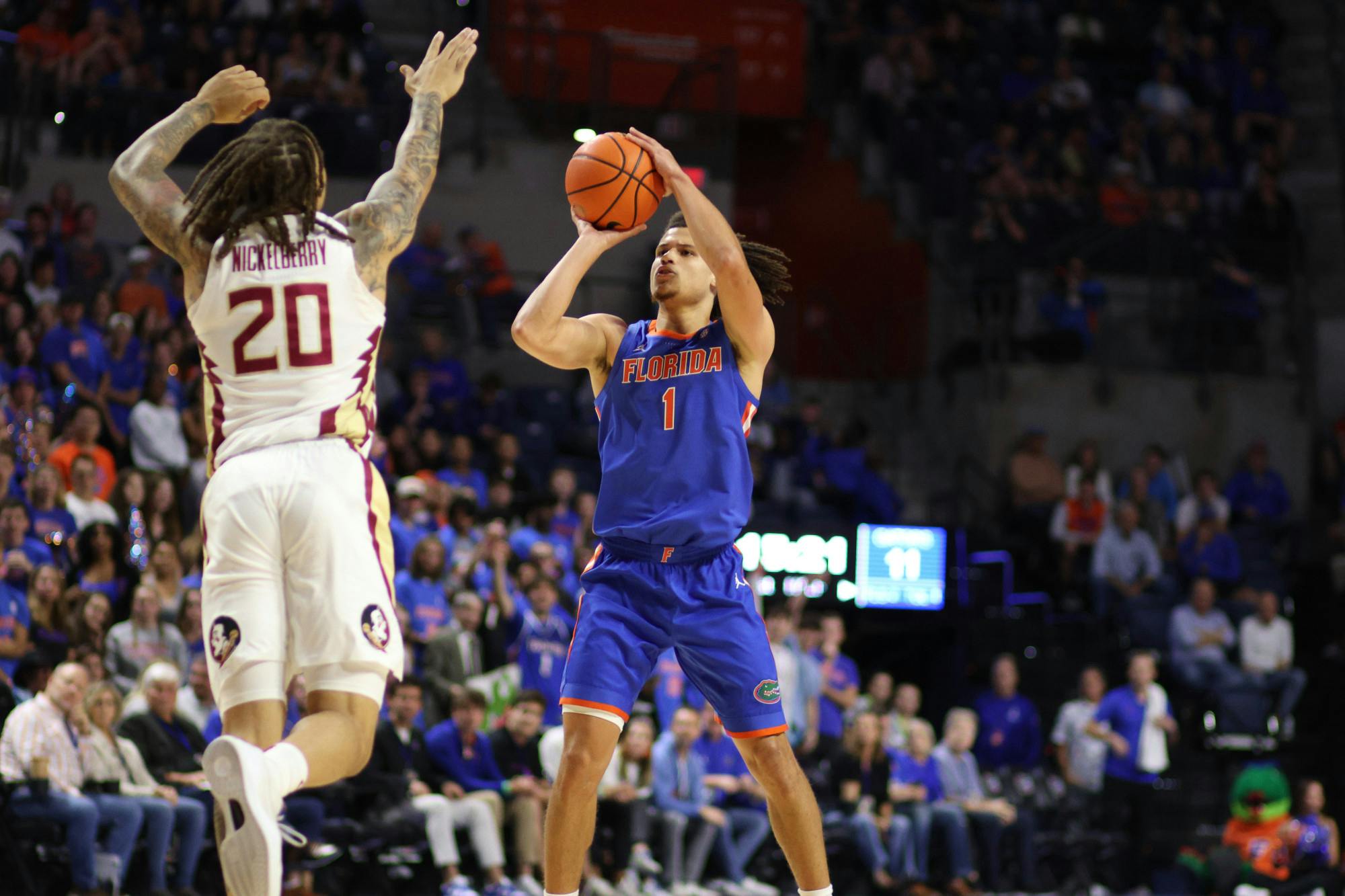 Junior guard Walter Clayton Jr. attempts a jumper in the Gators' 89-68 win against the Florida State Seminoles on Friday, Nov. 17, 2023.