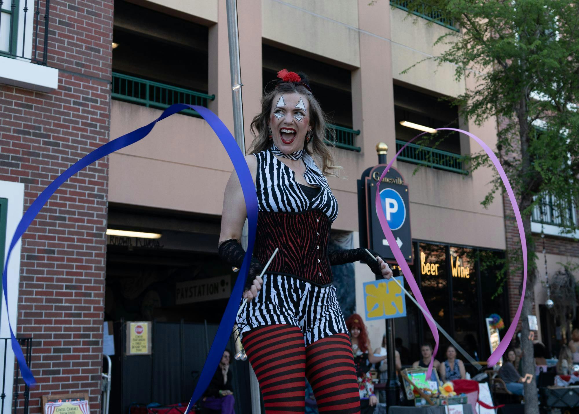 Cabaret artists perform on the streets at Big Culture & Arts Festival on Saturday, April 11, 2026.