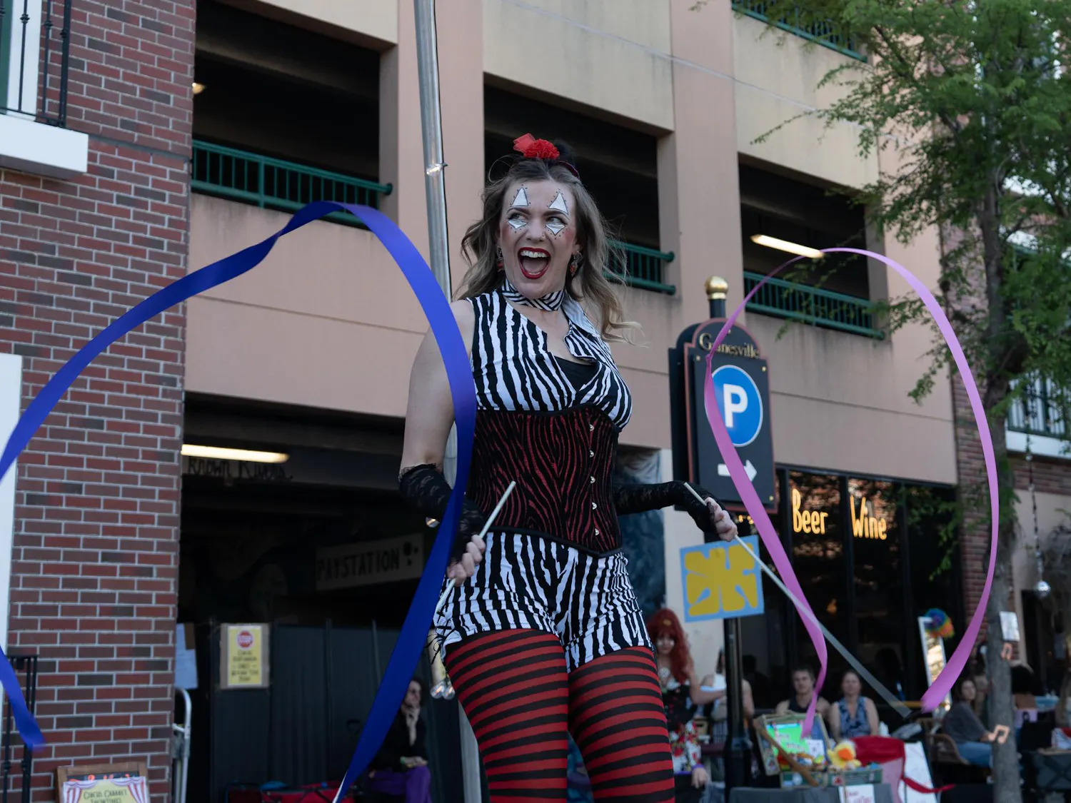 Cabaret artists perform on the streets at Big Culture & Arts Festival on Saturday, April 11, 2026.
