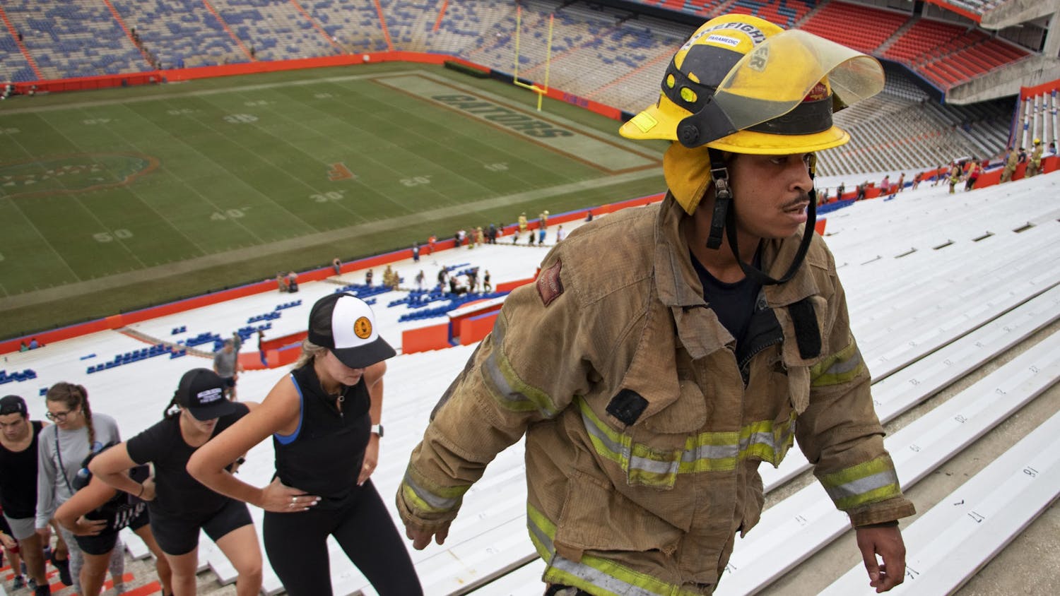 Anthony “Hutch” Hutchinson, Gainesville Fire Rescue first responder, marches up the stadium steps during the 5th Annual UF Collegiate Veterans Society 9/11 Memorial Stair Climb at Ben Hill Griffin Stadium on Saturday, Sept. 11, 2021.