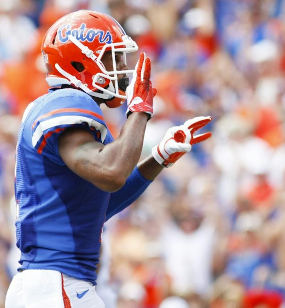 <p>Redshirt sophomore wide receiver Quinton Dunbar celebrates after scoring a touchdown against Kentucky at Ben Hill Griffin Stadium on Sept. 22, 2012 in Ben Hill Griffin Stadium. Dunbar leads the Gators in receptions and yards.</p>