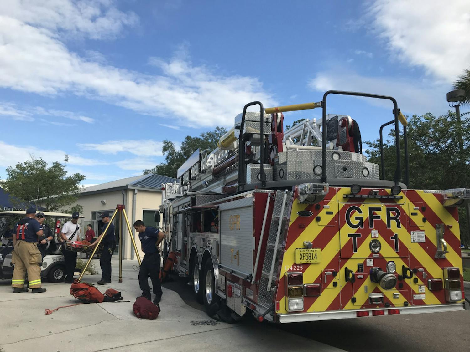 Gainesville firefighters set up one of their trucks outside of the Sante Fe Police Department where the expo was held. 