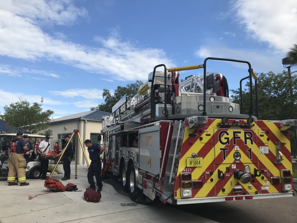 <p dir="ltr"><span>Gainesville firefighters set up one of their trucks outside of the Sante Fe Police Department where the expo was held.</span></p><p><span> </span></p>