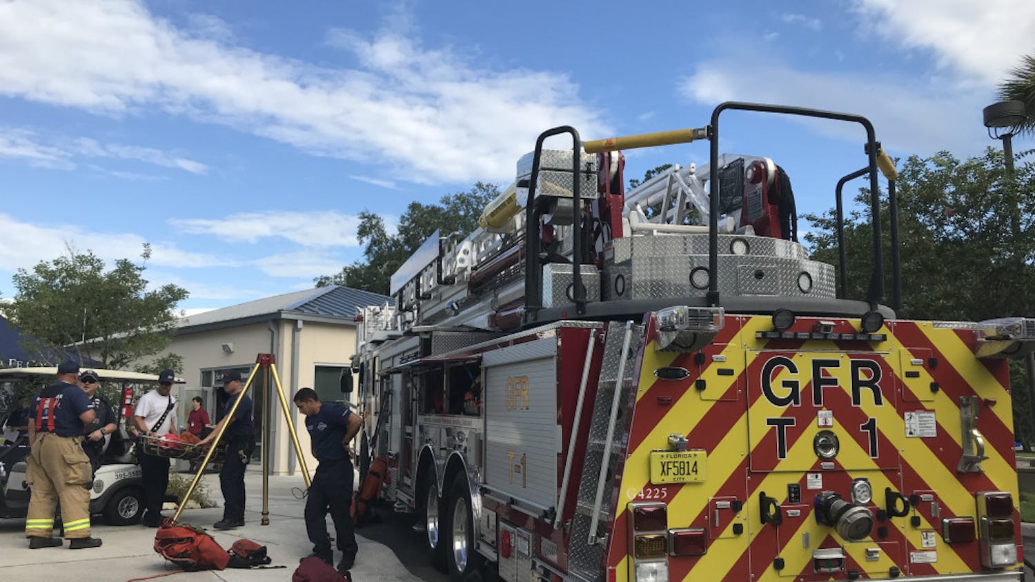 Gainesville firefighters set up one of their trucks outside of the Sante Fe Police Department where the expo was held. 