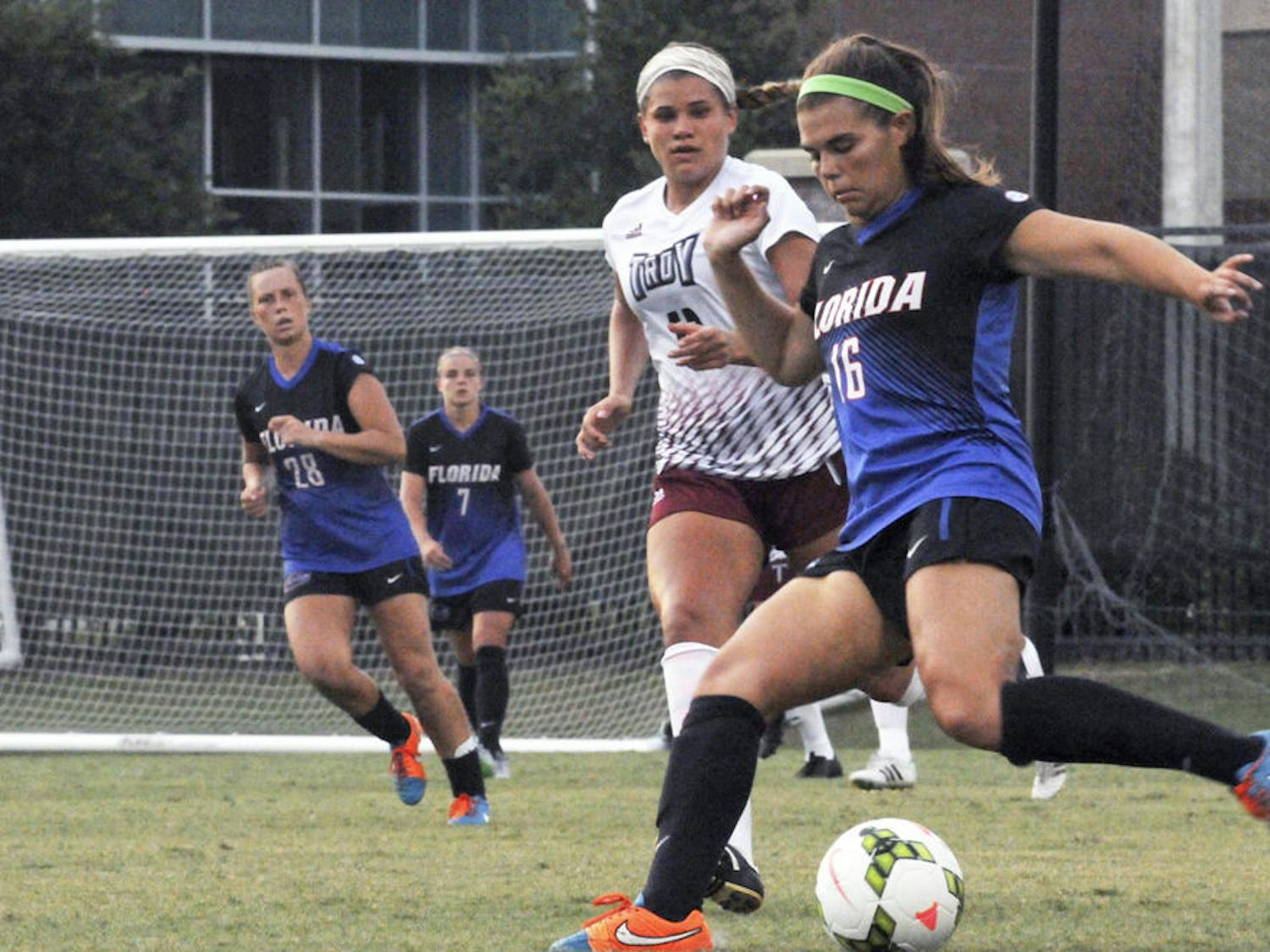 UF midfielder Liz Slattery dribbles during Florida's 2-1 win against Troy in an exhibition match on Aug. 11, 2015, at the soccer practice field at Donald R. Dizney Stadium.