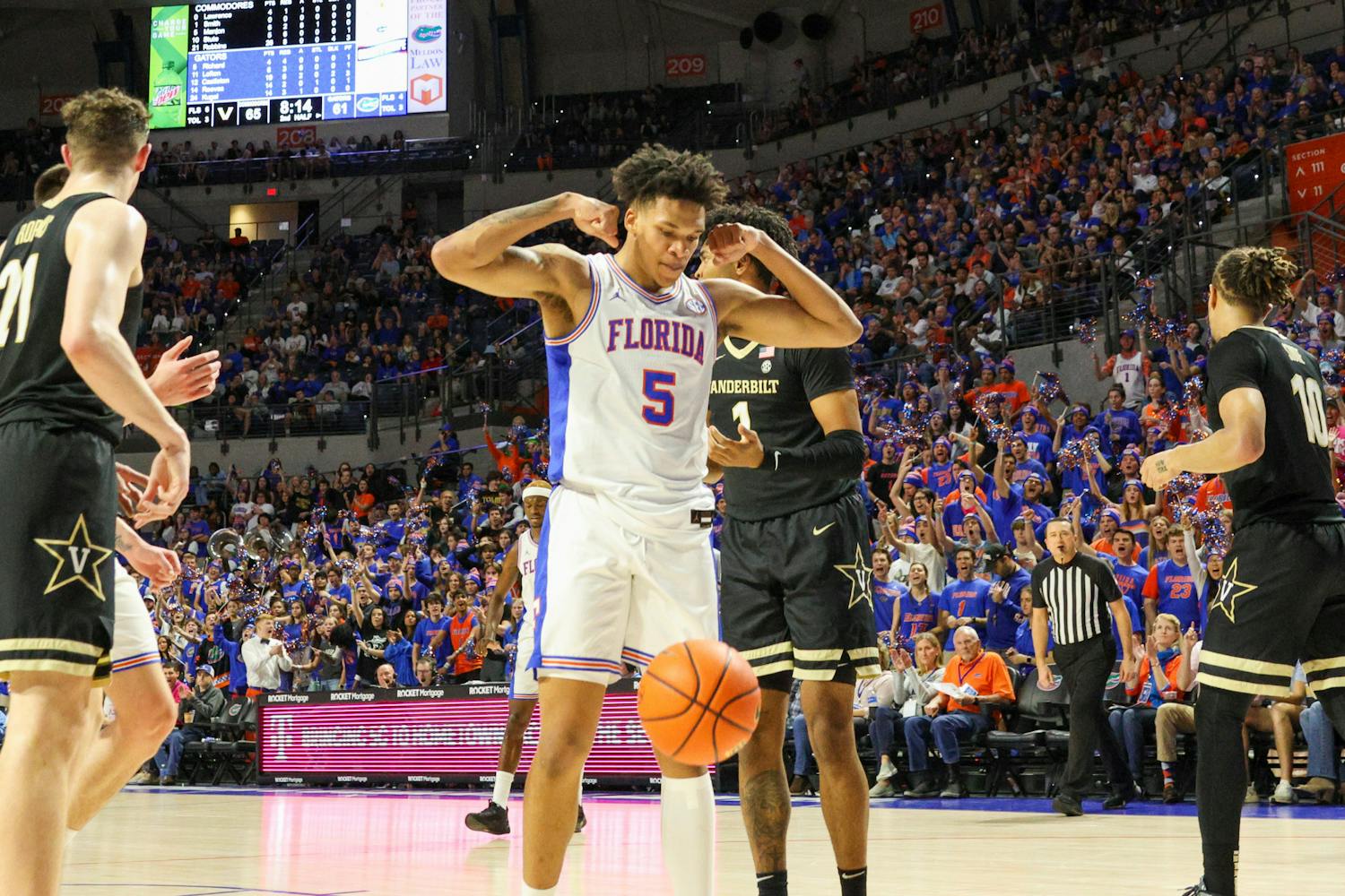 Gators guard Will Richard flexes after finishing a shot against the Vanderbilt Commodores in an 88-80 defeat, Saturday, Feb. 11, 2023. 