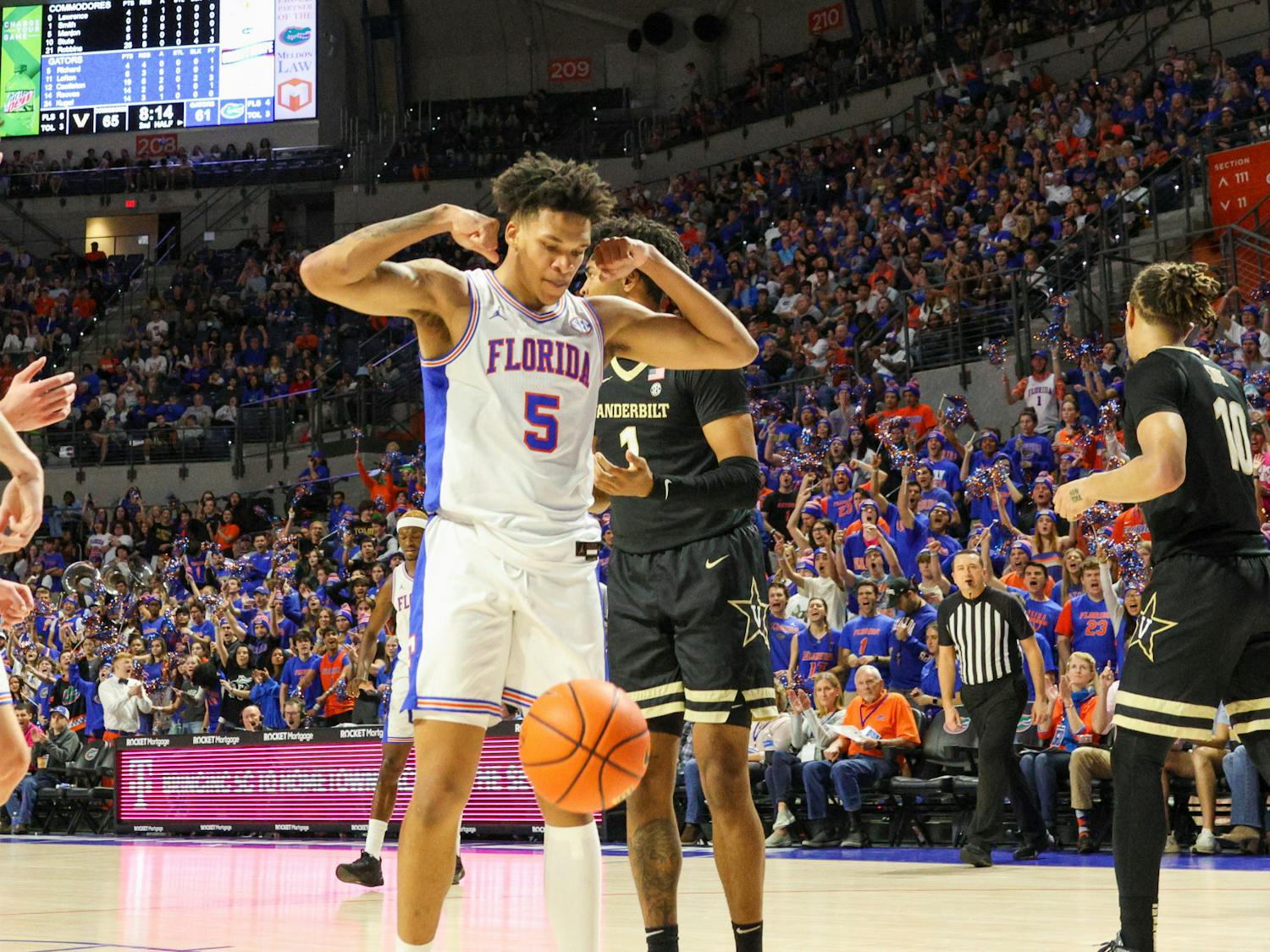 Gators guard Will Richard flexes after finishing a shot against the Vanderbilt Commodores in an 88-80 defeat, Saturday, Feb. 11, 2023. 