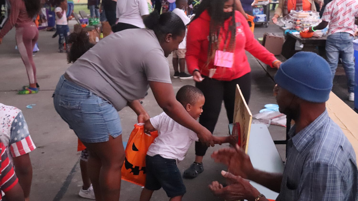 Kids play games during Youth Night and Community Fall Festival at Duval Early Learning Academy on Thursday, Oct. 28, 2021. The festival was meant to bring children together with rising gun violence among youth.