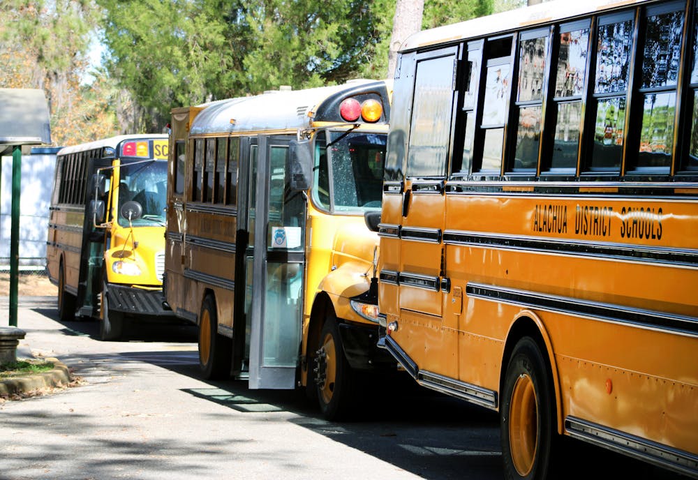 Alachua County Public School buses await students at Littlewood Elementary School on Wednesday, Feb. 2.
