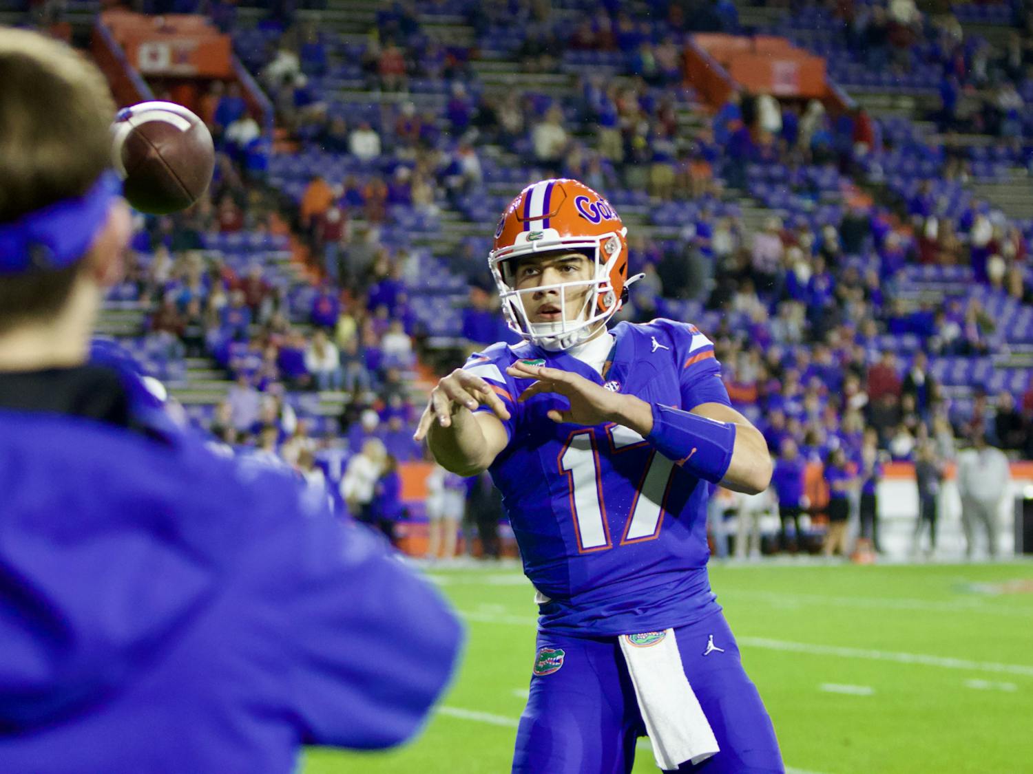 Florida quarterback Max Brown warms up ahead of the Gators matchup with the No. 5 Florida State Seminoles on Saturday, Nov. 25, 2023.