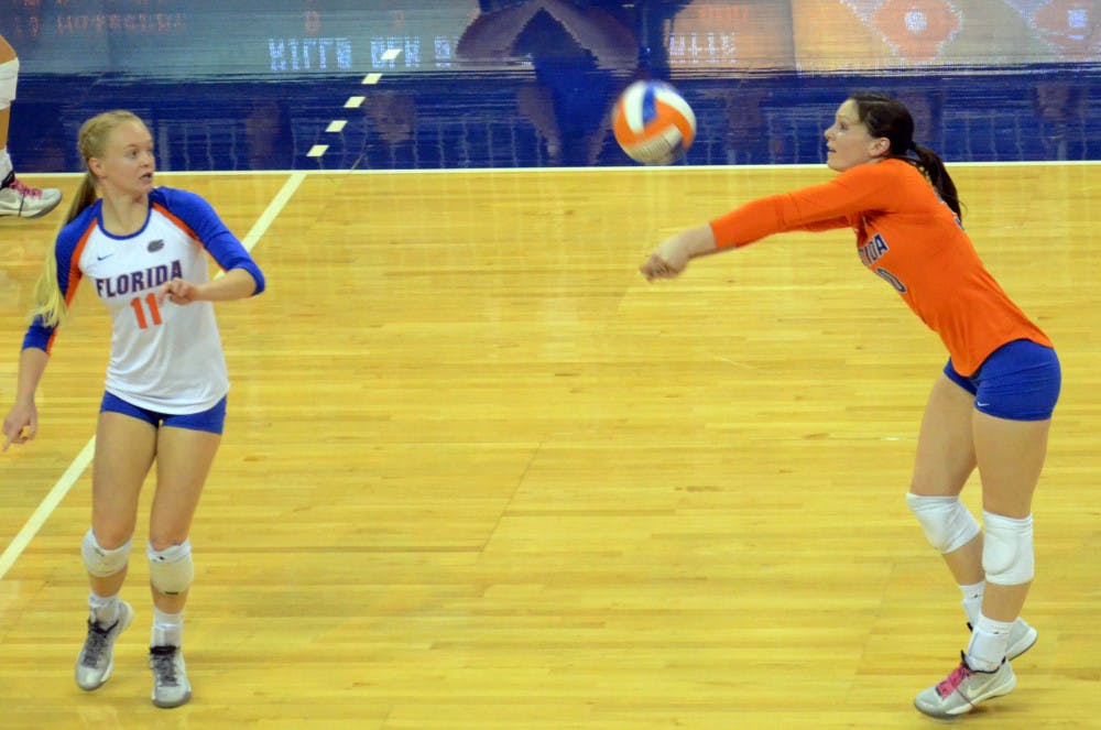 Holly Pole digs a ball during Florida's 3-0 win against South Carolina on Wednesday in the O'Connell Center.