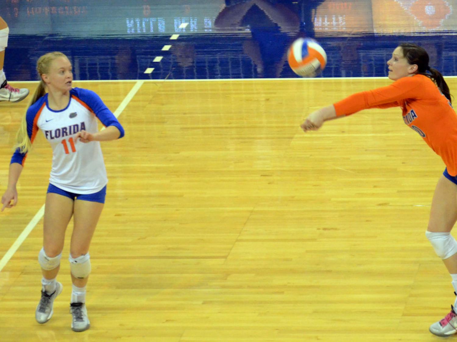 Holly Pole digs a ball during Florida's 3-0 win against South Carolina on Wednesday in the O'Connell Center.