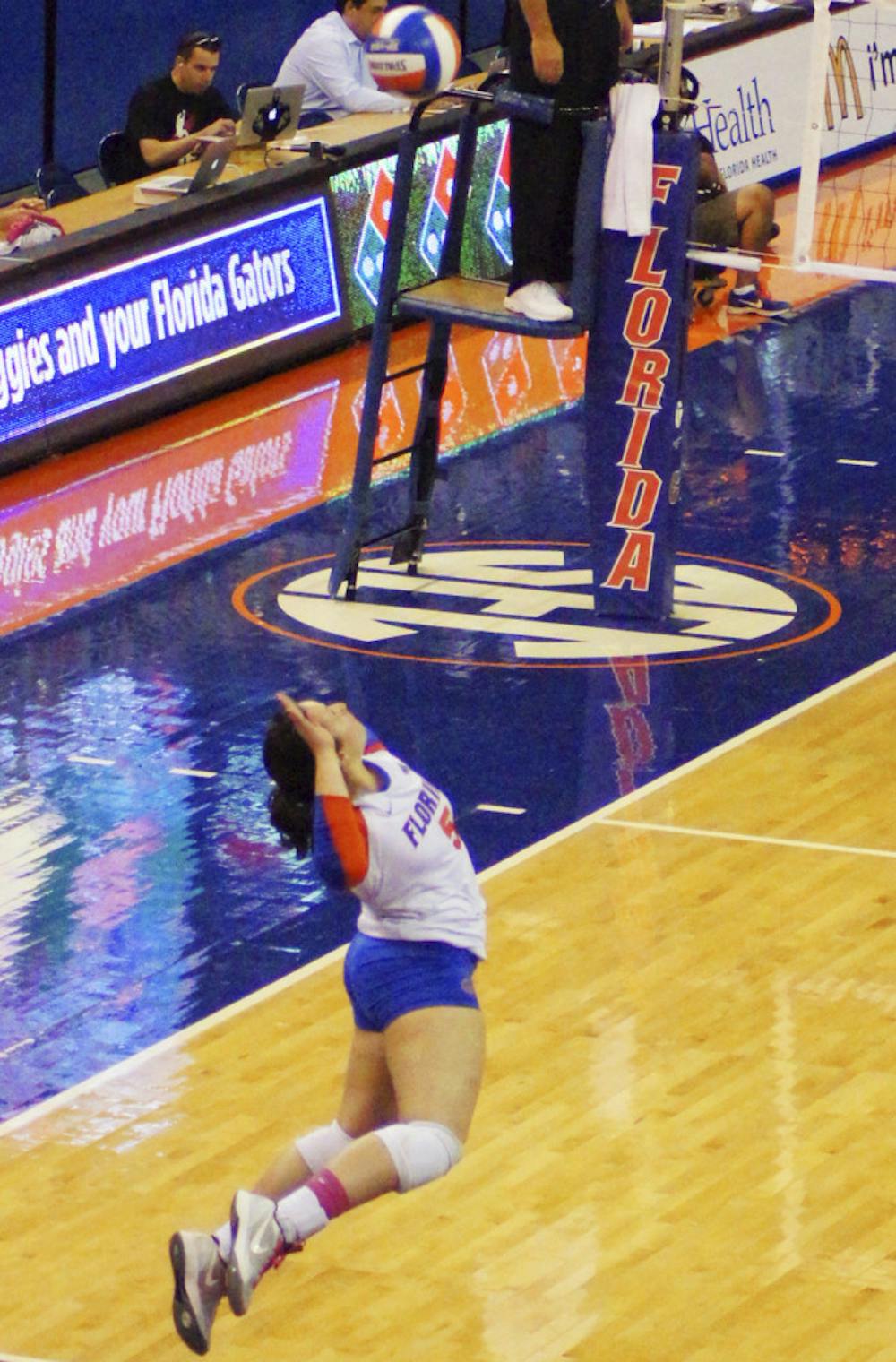 <p>Taylor Unroe jumps to serve during Florida's 3-0 win against Texas A&amp;M on Sunday in the O'Connell Center.</p>
