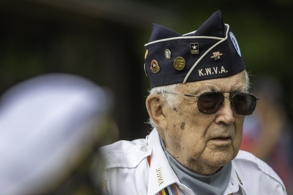 Kenneth Sassaman, an 86-year-old Korean War veteran and Gainesville resident, listens to a speaker Saturday at the Vietnam Veterans Tribute event at Veterans Memorial Park, 7400 SW 41st Place. Sassaman served in the U.S. Army in the 25th division and 27th regiment, which was known as the “Wolfhounds.” “When these Vietnam veterans came home, they were treated like dirt,” he said. “Their recognition for them is fantastic. They deserve it. More than deserve it.”
