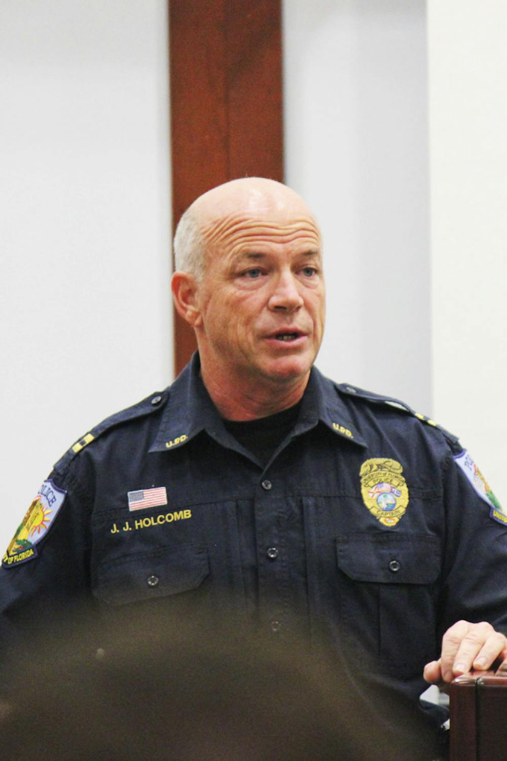 <p class="p1">University Police Capt. J.J. Holcomb announces to the UF Student Senate on Tuesday that if approved, Student Nighttime Auxiliary Patrol vans available will double to eight to reduce wait time and increase the system’s efficiency. </p>