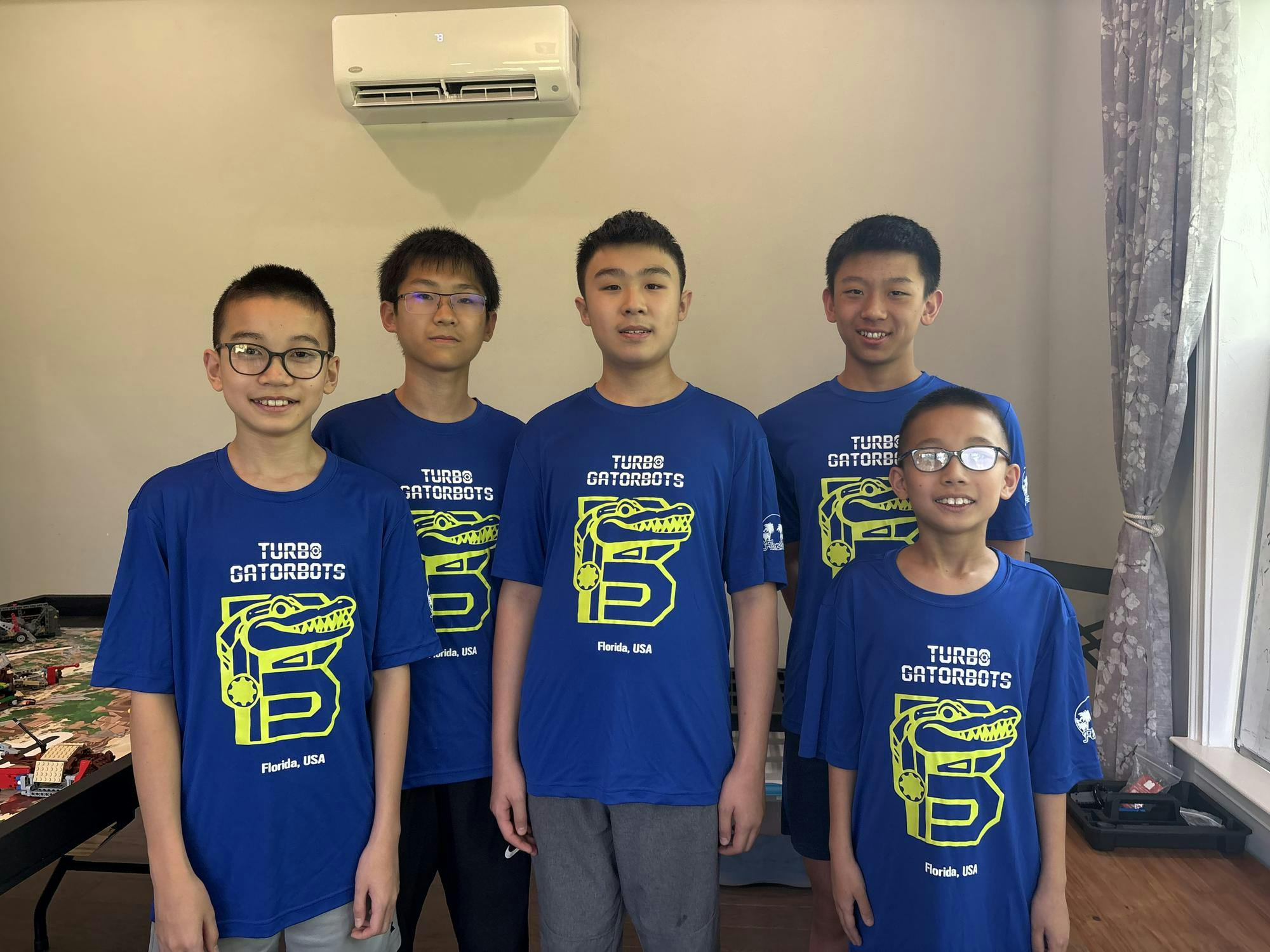 The Turbo Gatorbots pose for a photo.