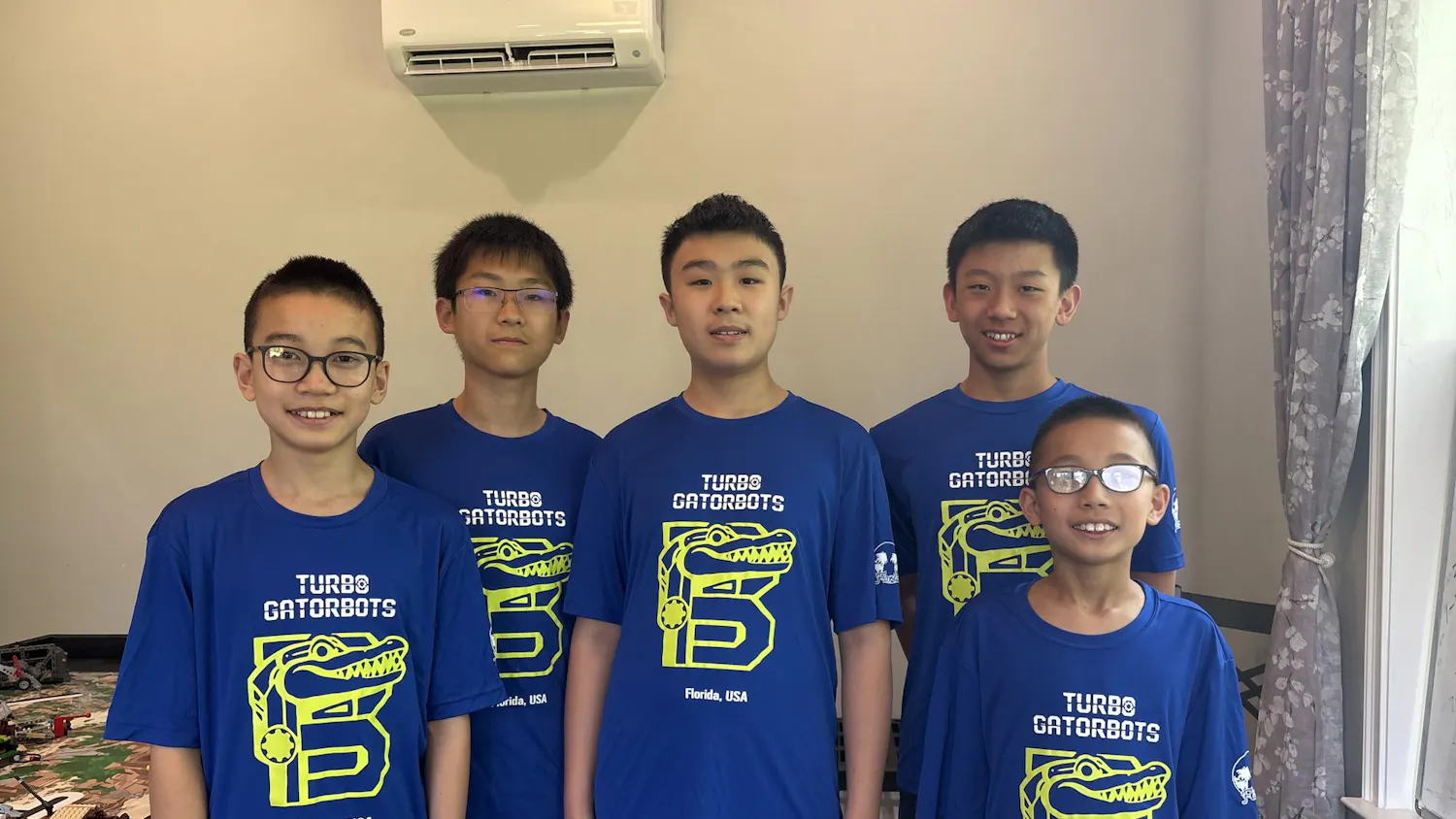 The Turbo Gatorbots pose for a photo.