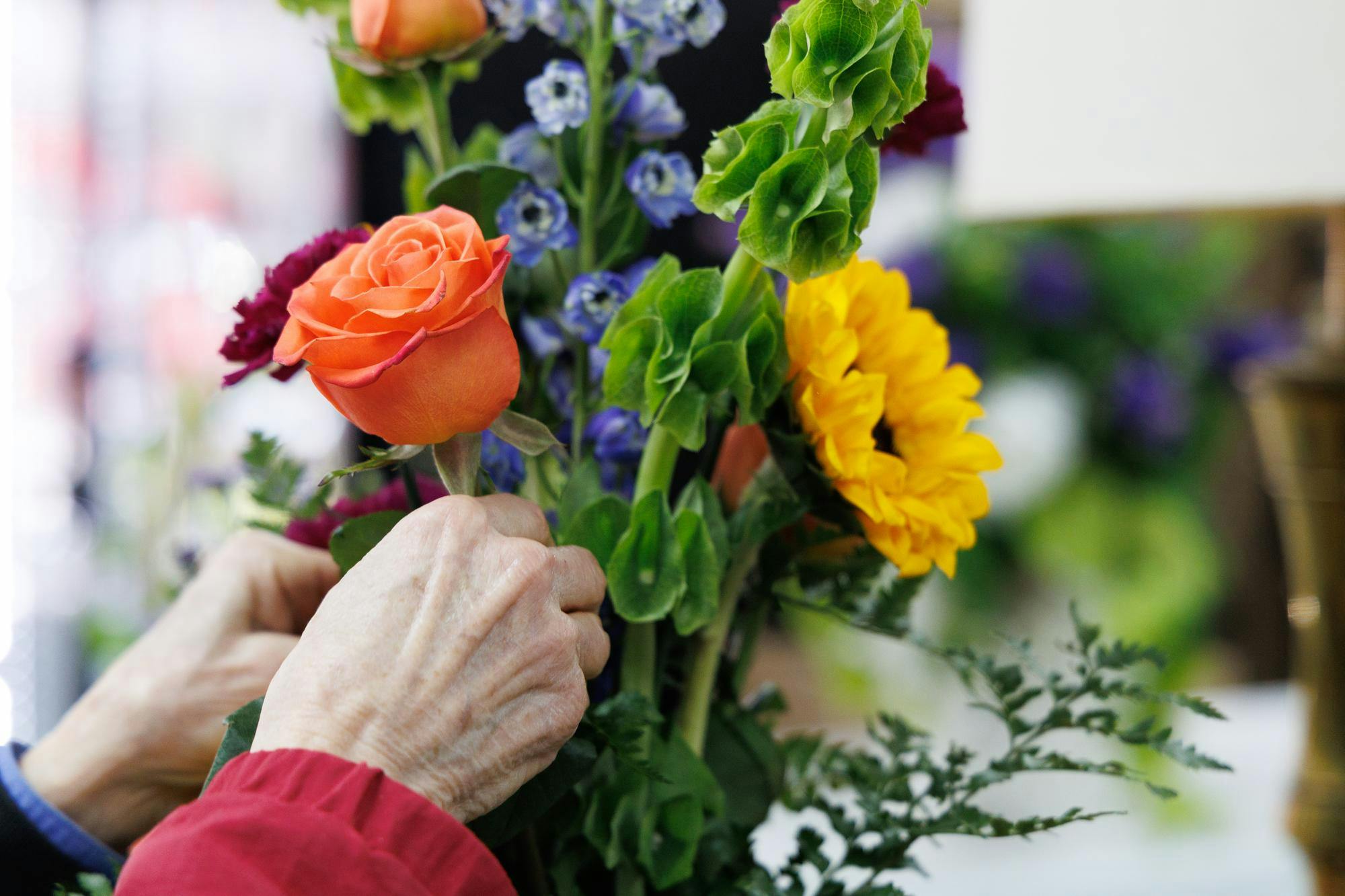 A flower bouquet is put together at The Flower Shop in Gainesville, Fla., Monday, Feb. 2, 2026.