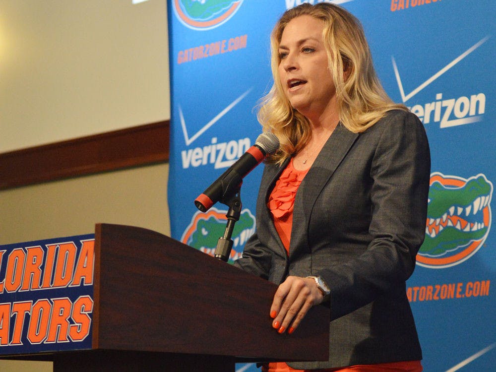 <p>UF women's basketball coach Amanda Butler speaks to reporters during Florida's media day on Thursday.</p>