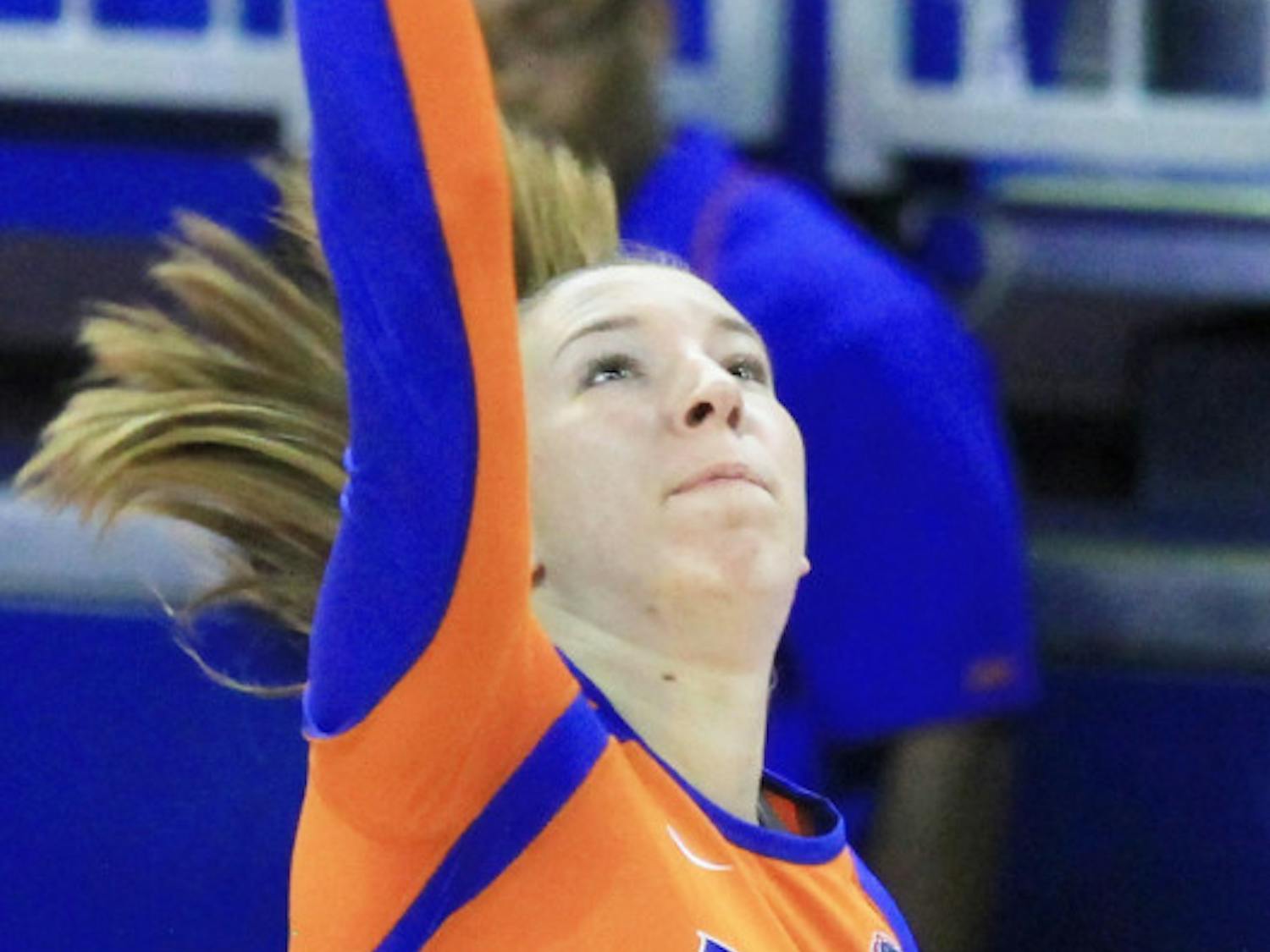 Ziva Recek (9) spikes the ball over the net against Florida Gulf Coast University, Aug. 25, 2012, at the O'Connell Center. Recek took a team-high 40 swings Friday night against LIU-Brooklyn.
