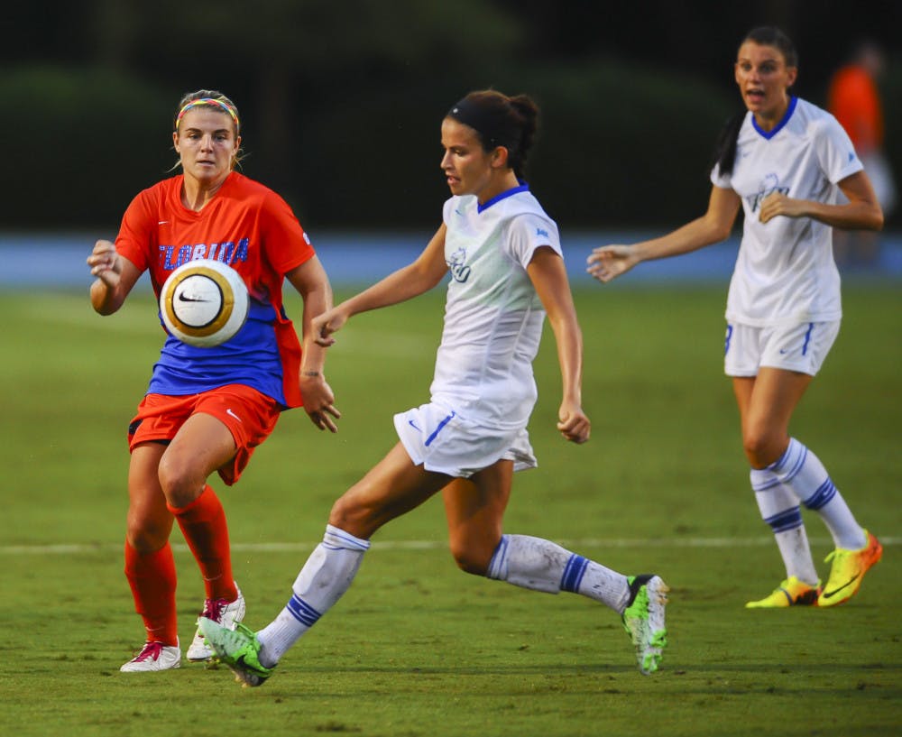 <p>Freshman forward Savannah Jordan fights for possession of the ball during Florida's 3-1 win against Florida Gulf Coast on Aug. 23 night at James G. Pressly Stadium.</p>